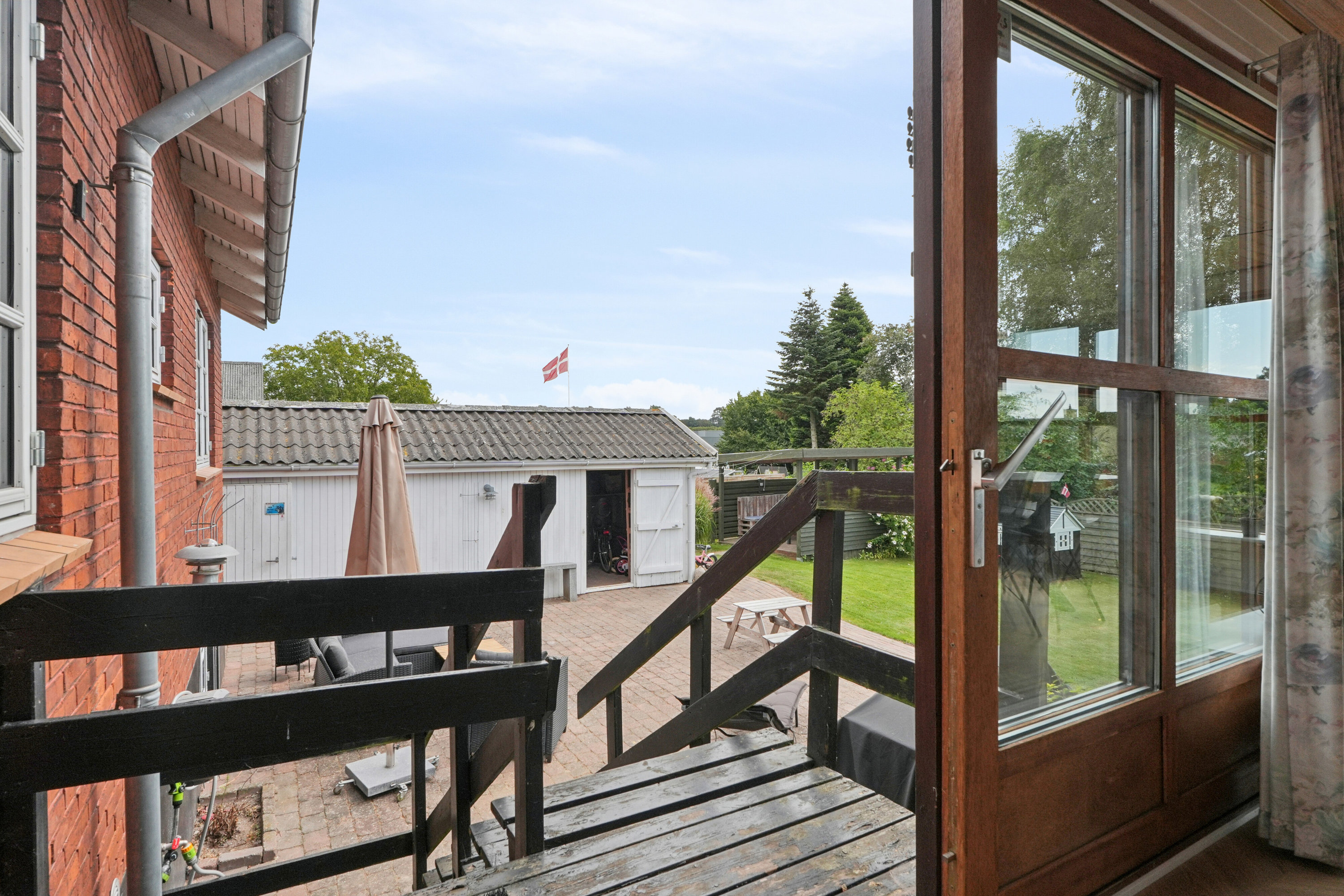 Fremhævet udendørs billede i fuldskærmstilstand. Billede af Stationsvej 68, 5771 Stenstrup