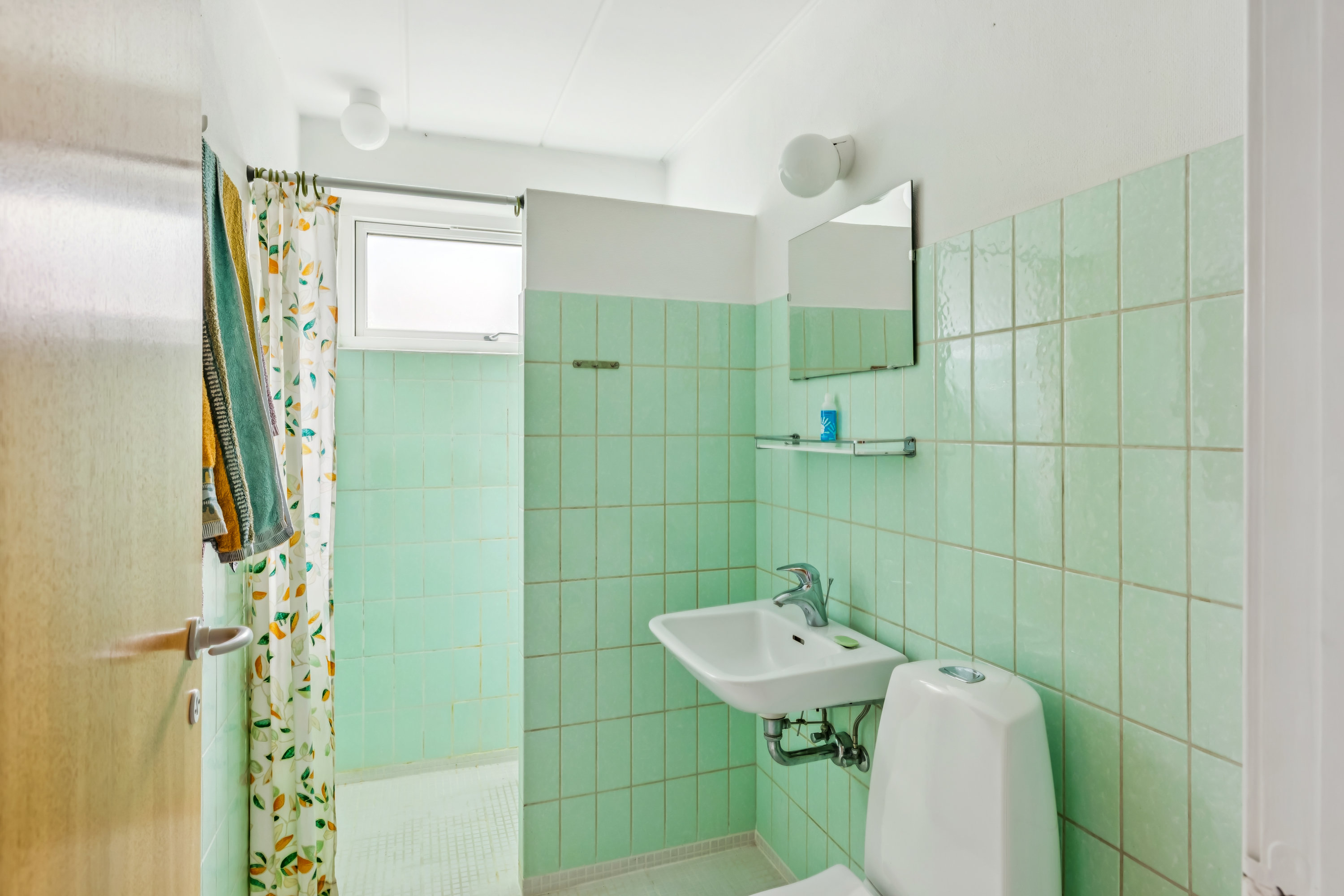 Fremhævet badeværelse billede i fuldskærmstilstand. Billede af Engblommevej 25, 8410 Rønde