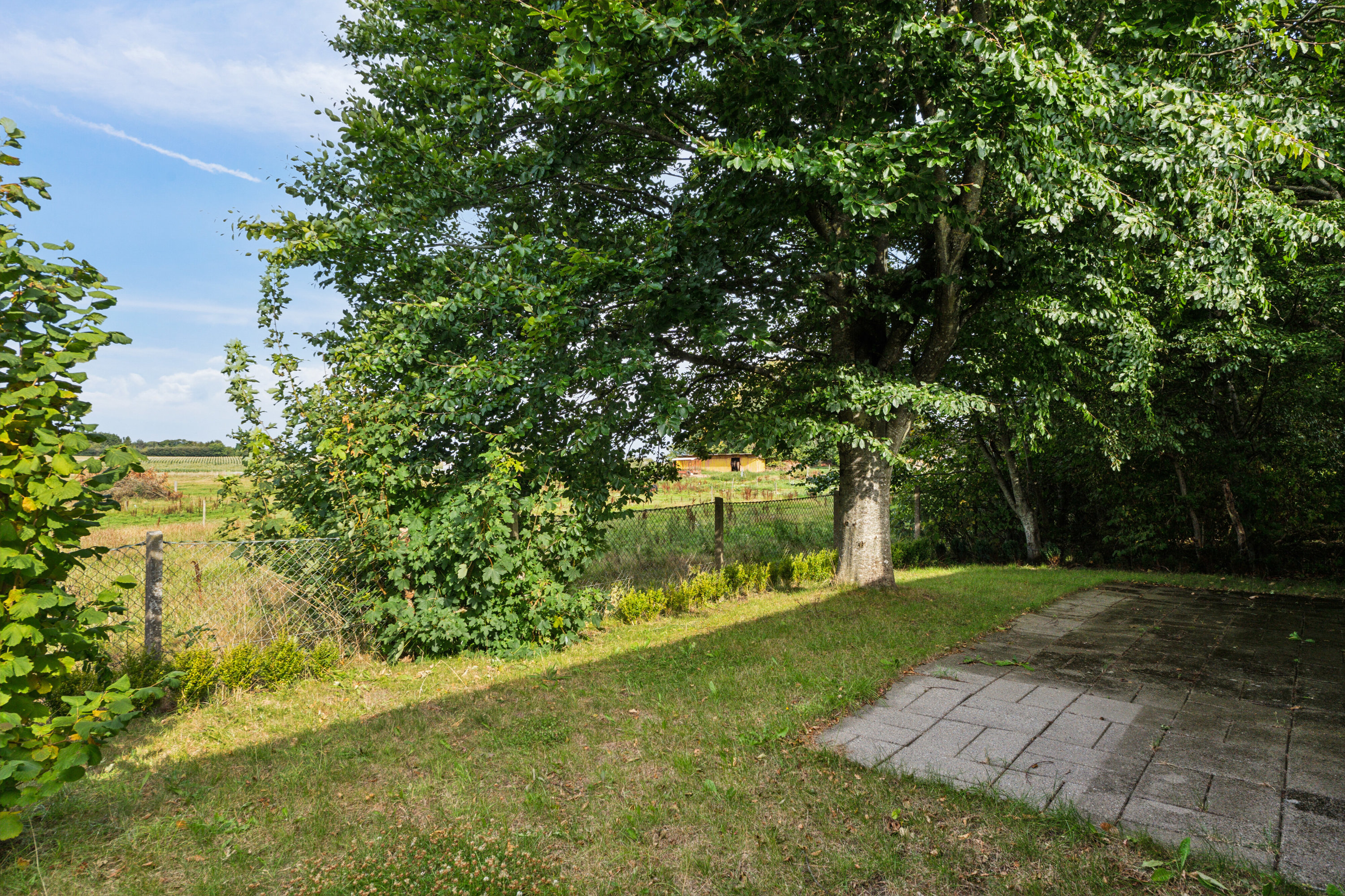 Fremhævet set fra haven billede i fuldskærmstilstand. Billede af Krogsgårdsvej 13F, Hvam, 8620 Kjellerup