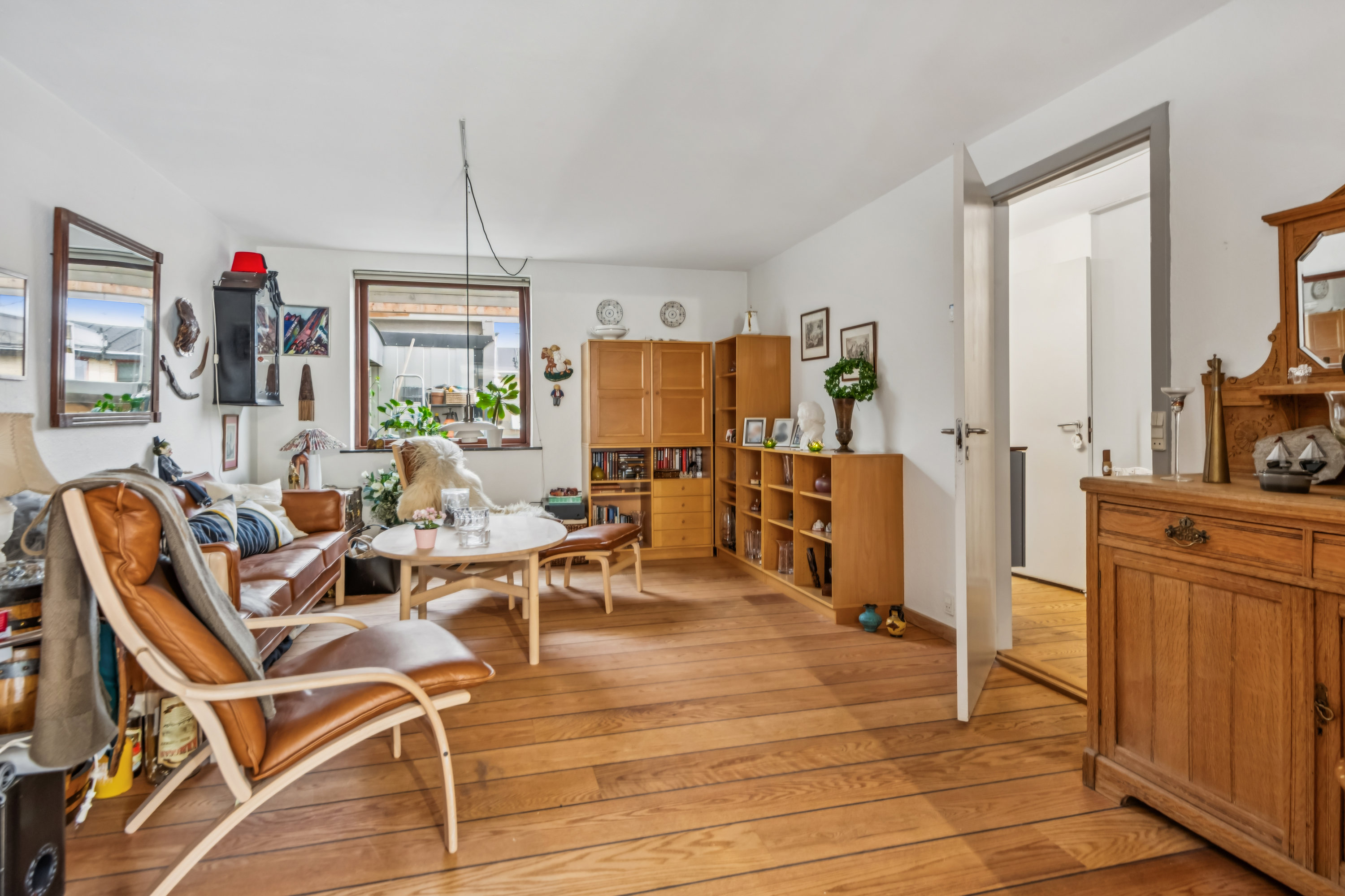 Fremhævet stue billede i fuldskærmstilstand. Billede af Godske Lindenovs Vej 211, Gug, 9210 Aalborg SØ