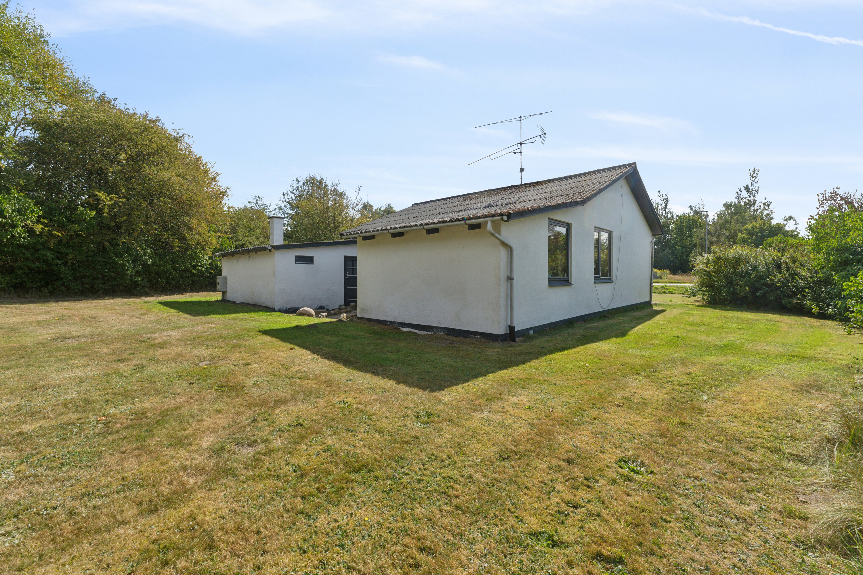 Fremhævet set fra haven billede i fuldskærmstilstand. Billede af Hørmestedvej 285, Hørmested, 9870 Sindal