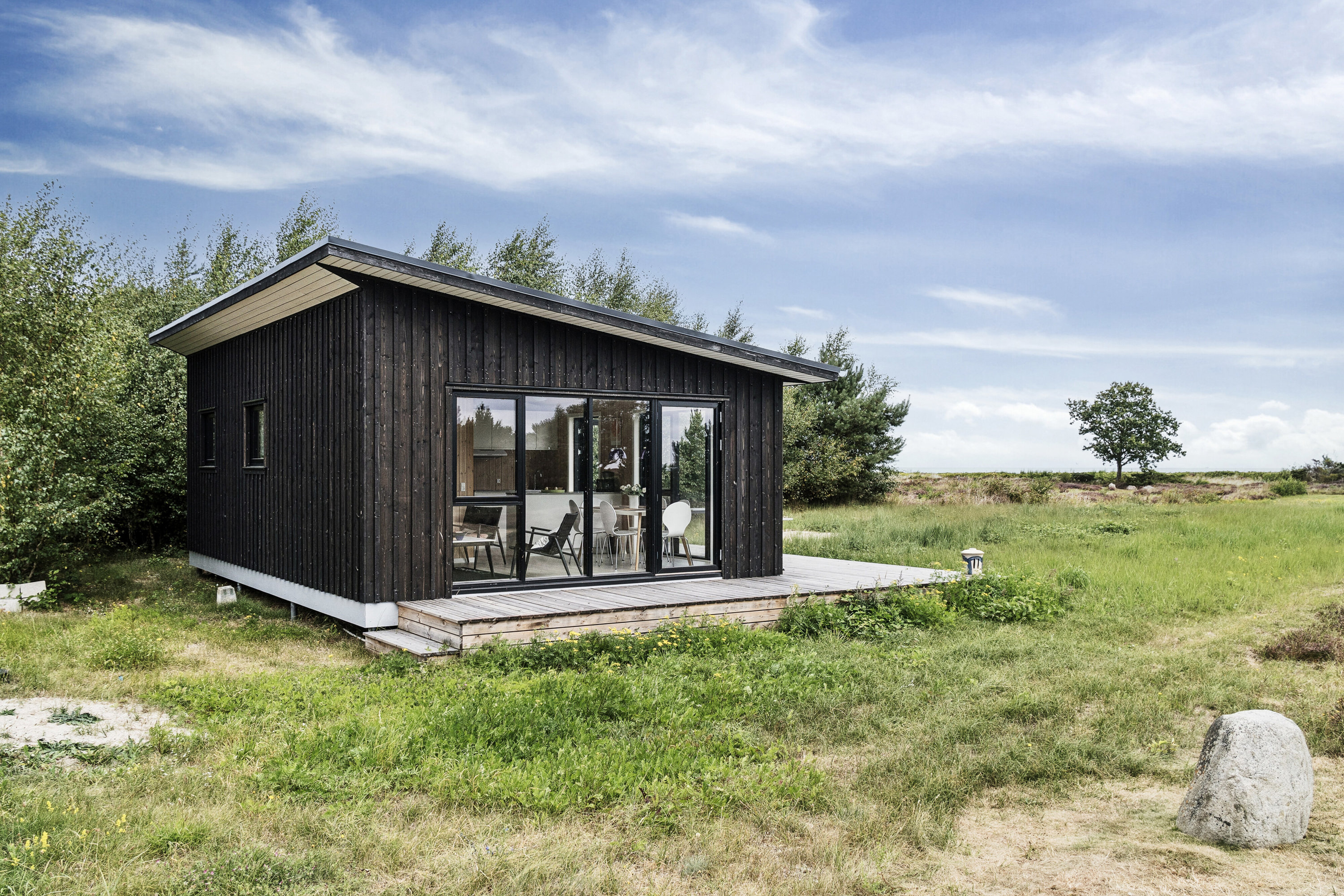 Fremhævet set fra haven billede i fuldskærmstilstand. Billede af Langesøvej 56, 4581 Rørvig