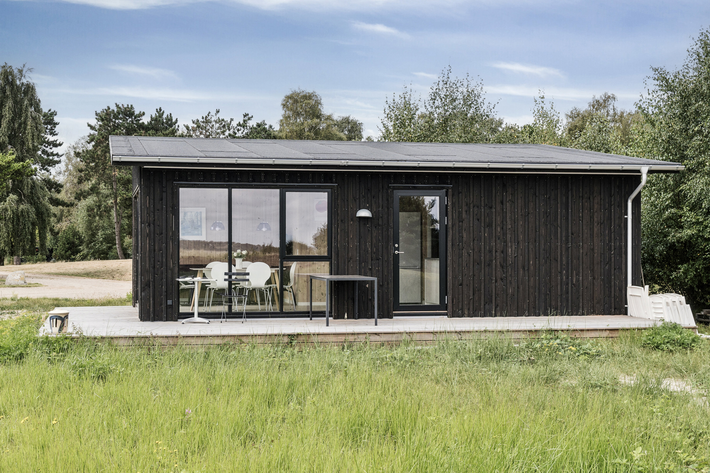 Fremhævet set fra haven billede i fuldskærmstilstand. Billede af Langesøvej 56, 4581 Rørvig