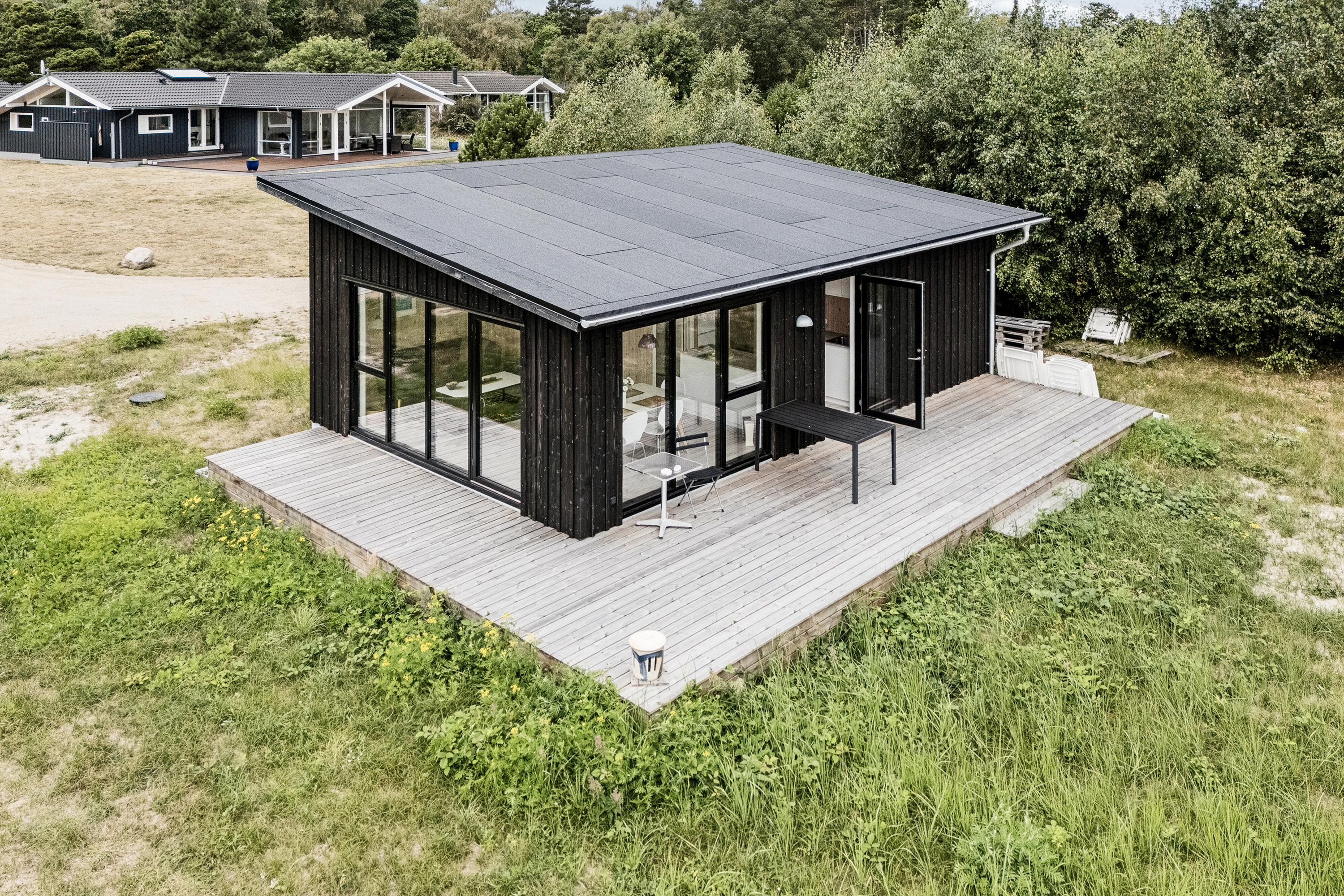 Fremhævet set fra haven billede i fuldskærmstilstand. Billede af Langesøvej 56, 4581 Rørvig