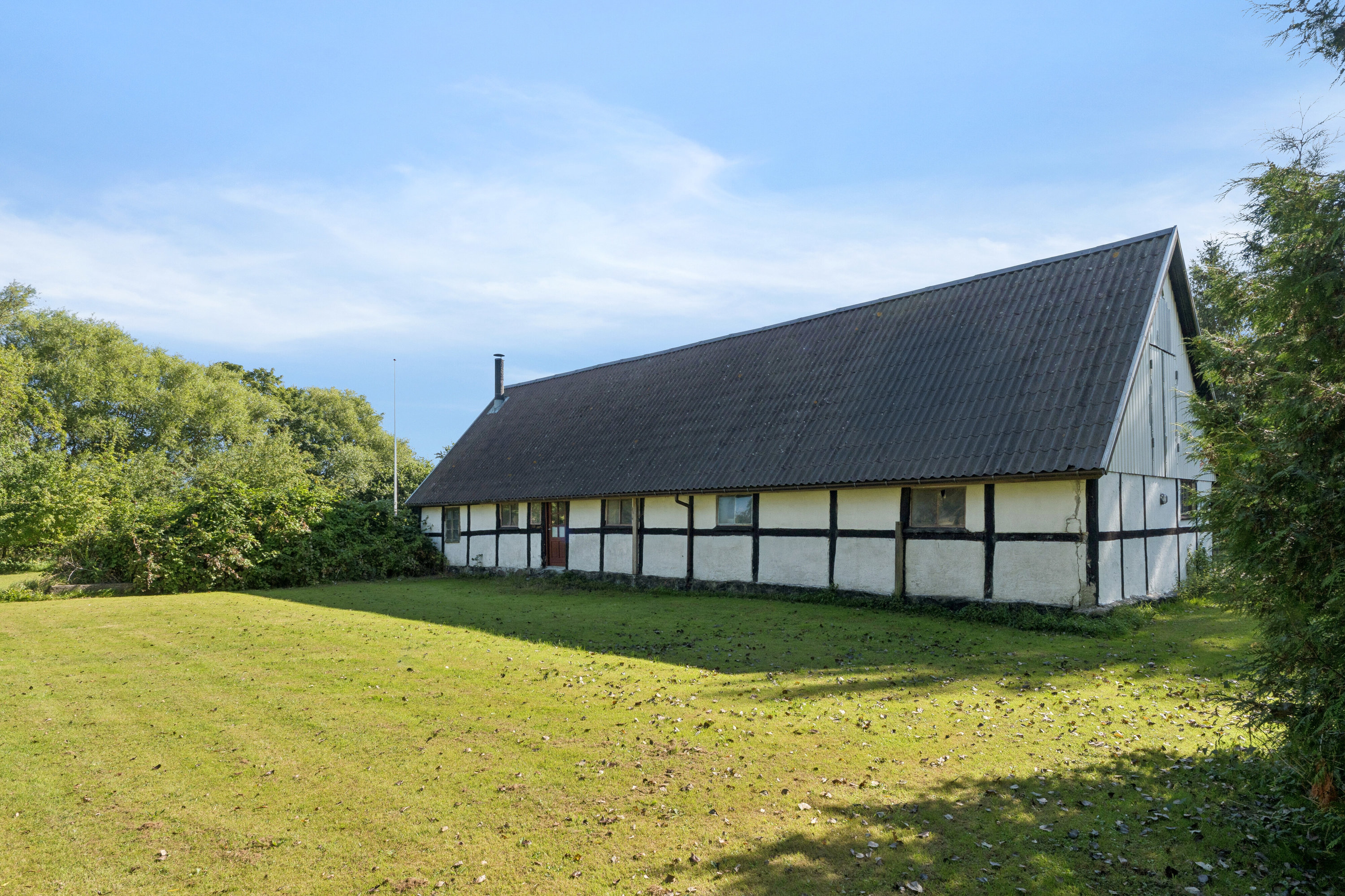 Fremhævet set fra haven billede i fuldskærmstilstand. Billede af Skov-Torupvej 15, Skov-Torup, 4683 Rønnede