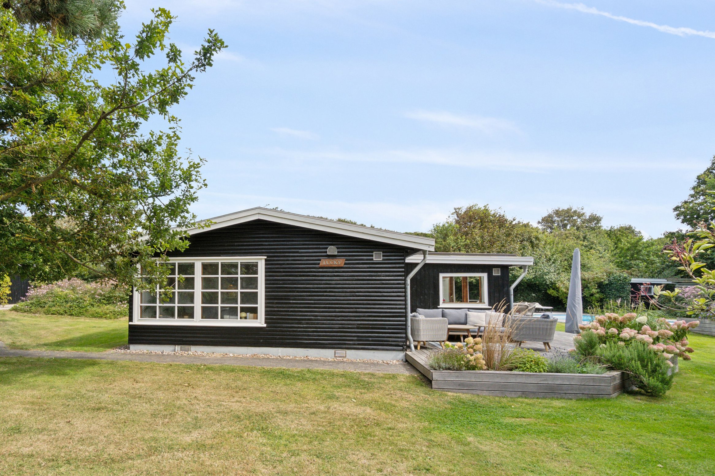 Miniaturebillede 1: set fra haven. Billede af Klintevej 28, Hald Strand, 3390 Hundested