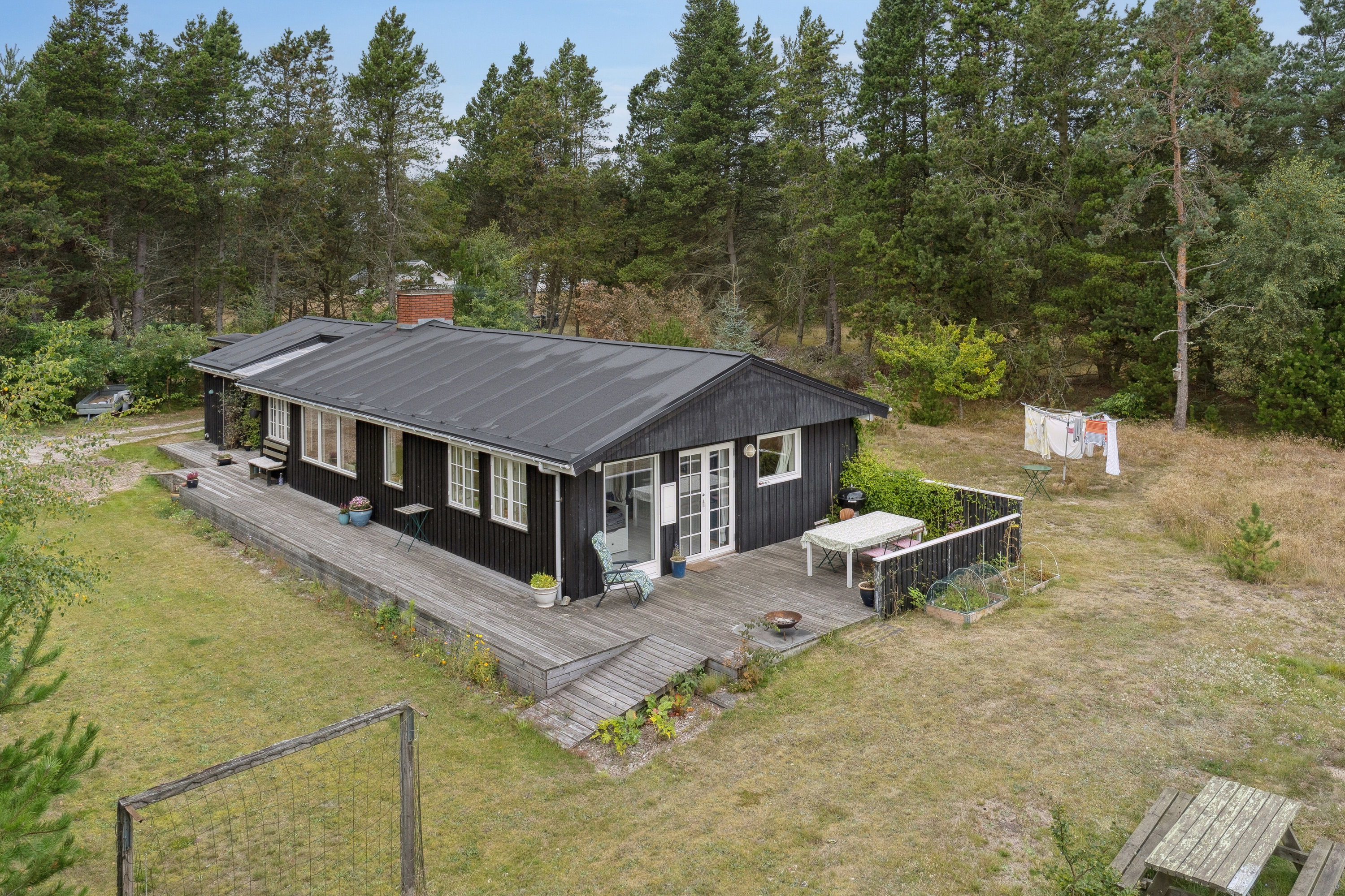 Fremhævet set fra haven billede i fuldskærmstilstand. Billede af Grønspættevej 9, Tversted, 9881 Bindslev