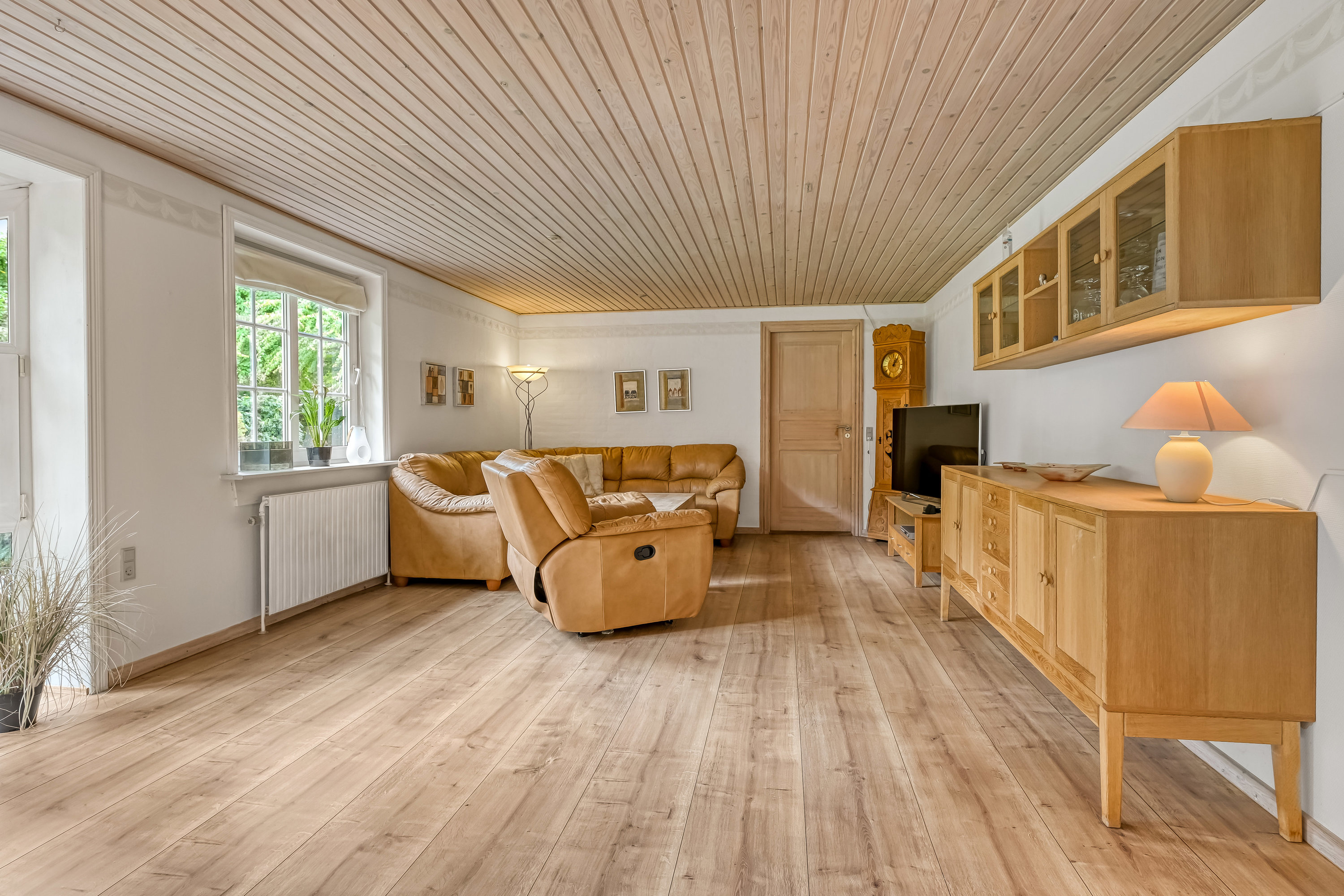 Fremhævet stue billede i fuldskærmstilstand. Billede af Stationsvej 35, Filskov, 7200 Grindsted