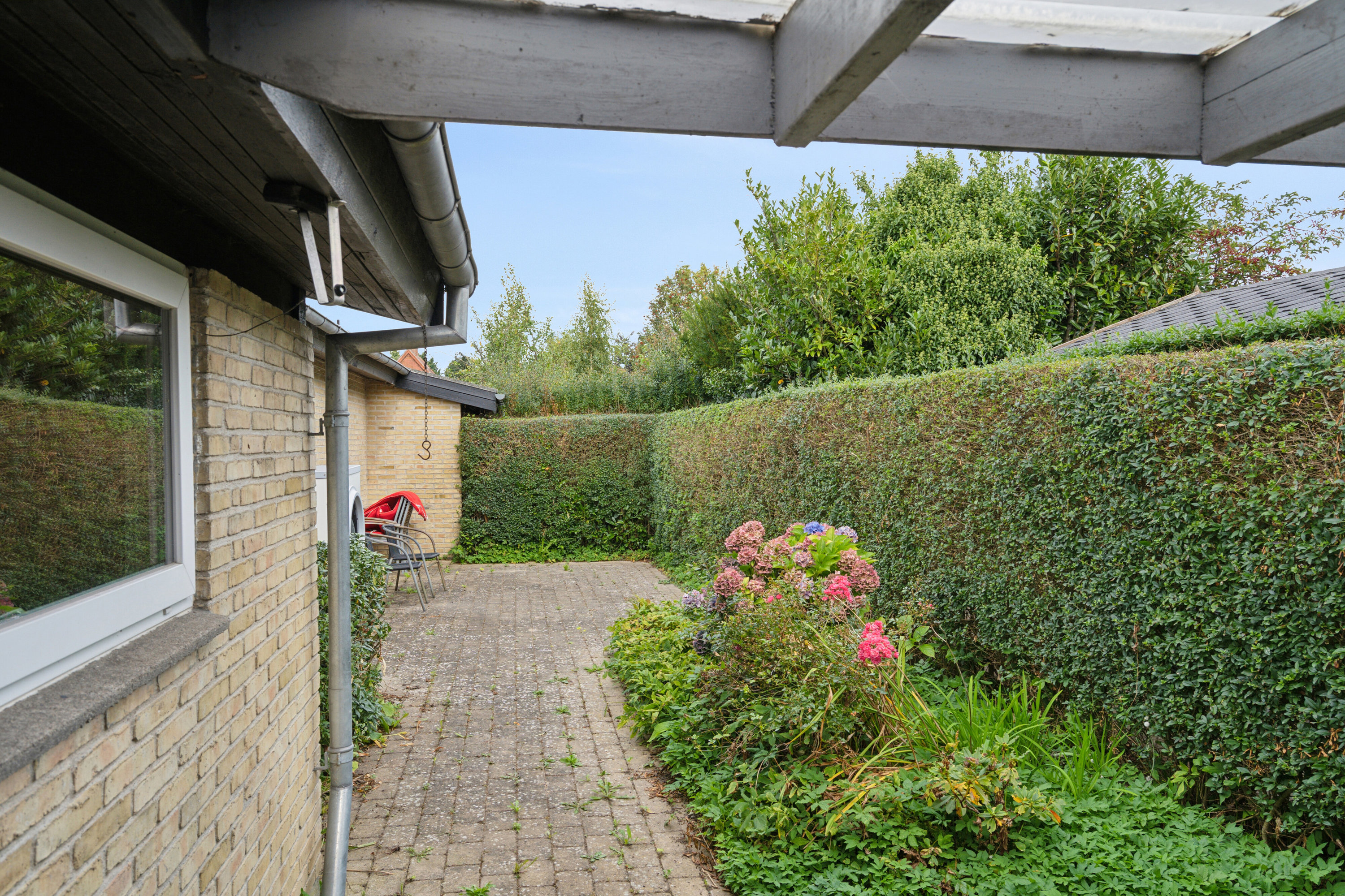 Fremhævet set fra haven billede i fuldskærmstilstand. Billede af Pilevænget 7, 5700 Svendborg