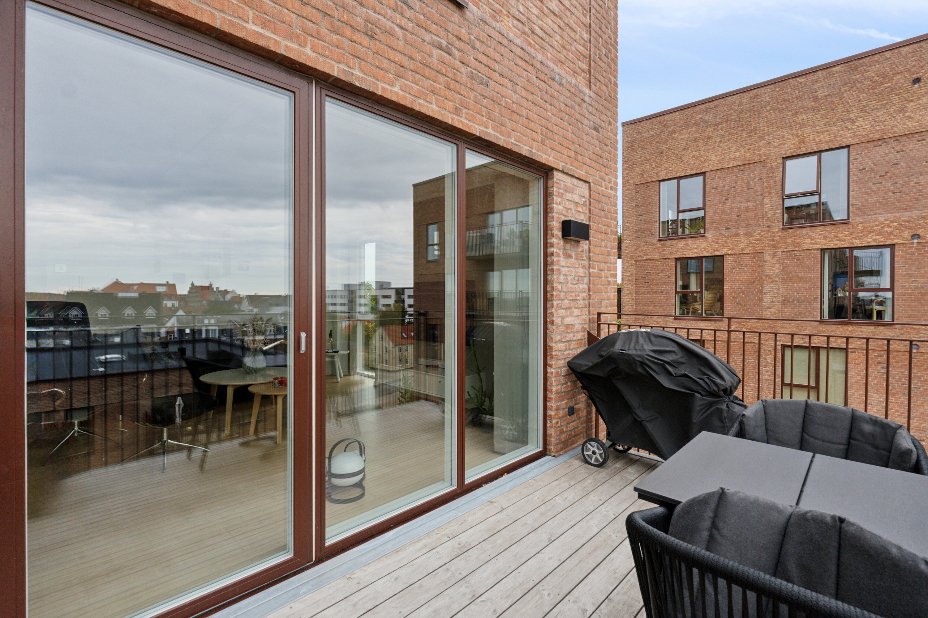 Fremhævet altan billede i fuldskærmstilstand. Billede af Dronningensgade 12G, 4. 4., 9800 Hjørring