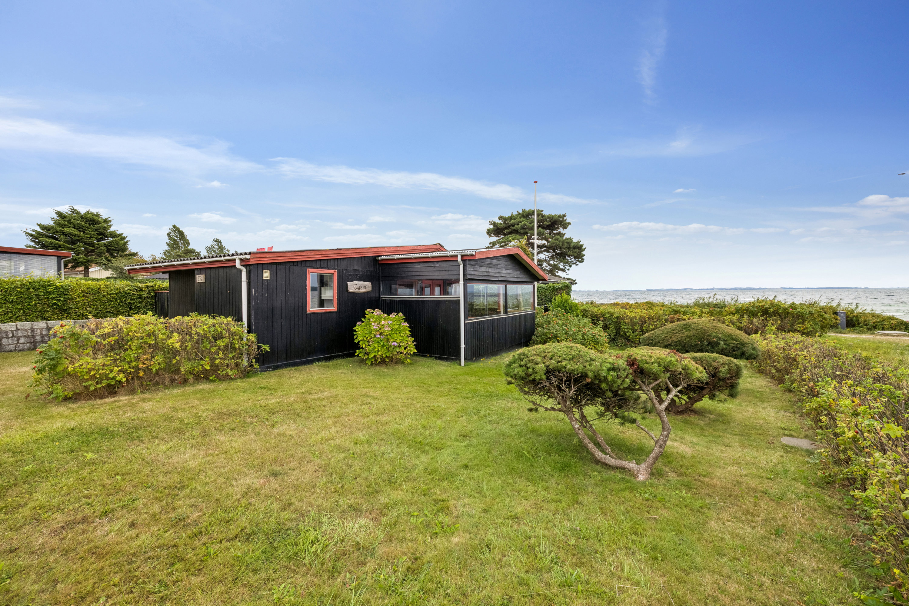 Fremhævet have billede i fuldskærmstilstand. Billede af Strandvejen 23A, 8410 Rønde