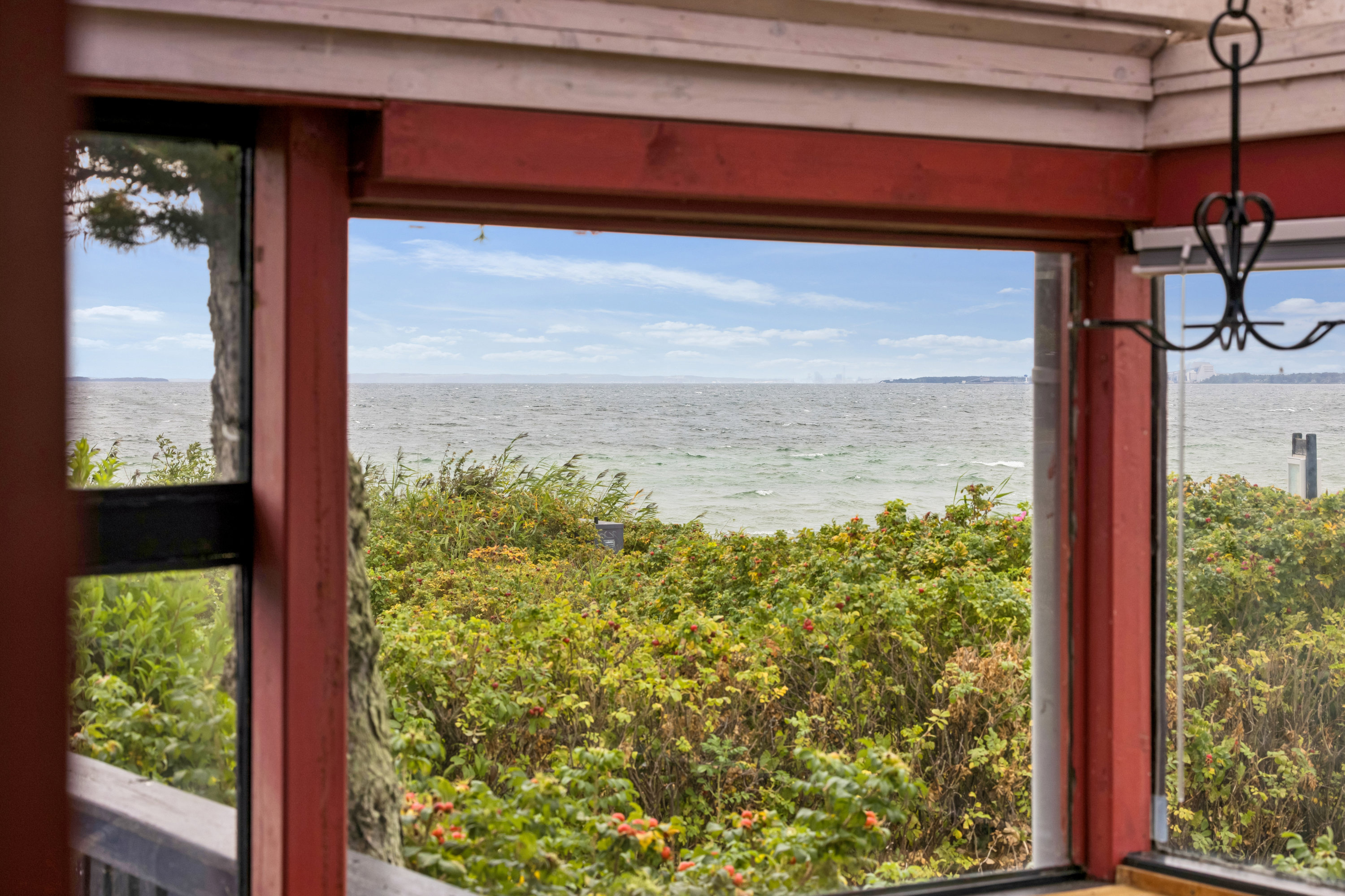 Fremhævet udsigt billede i fuldskærmstilstand. Billede af Strandvejen 23A, 8410 Rønde