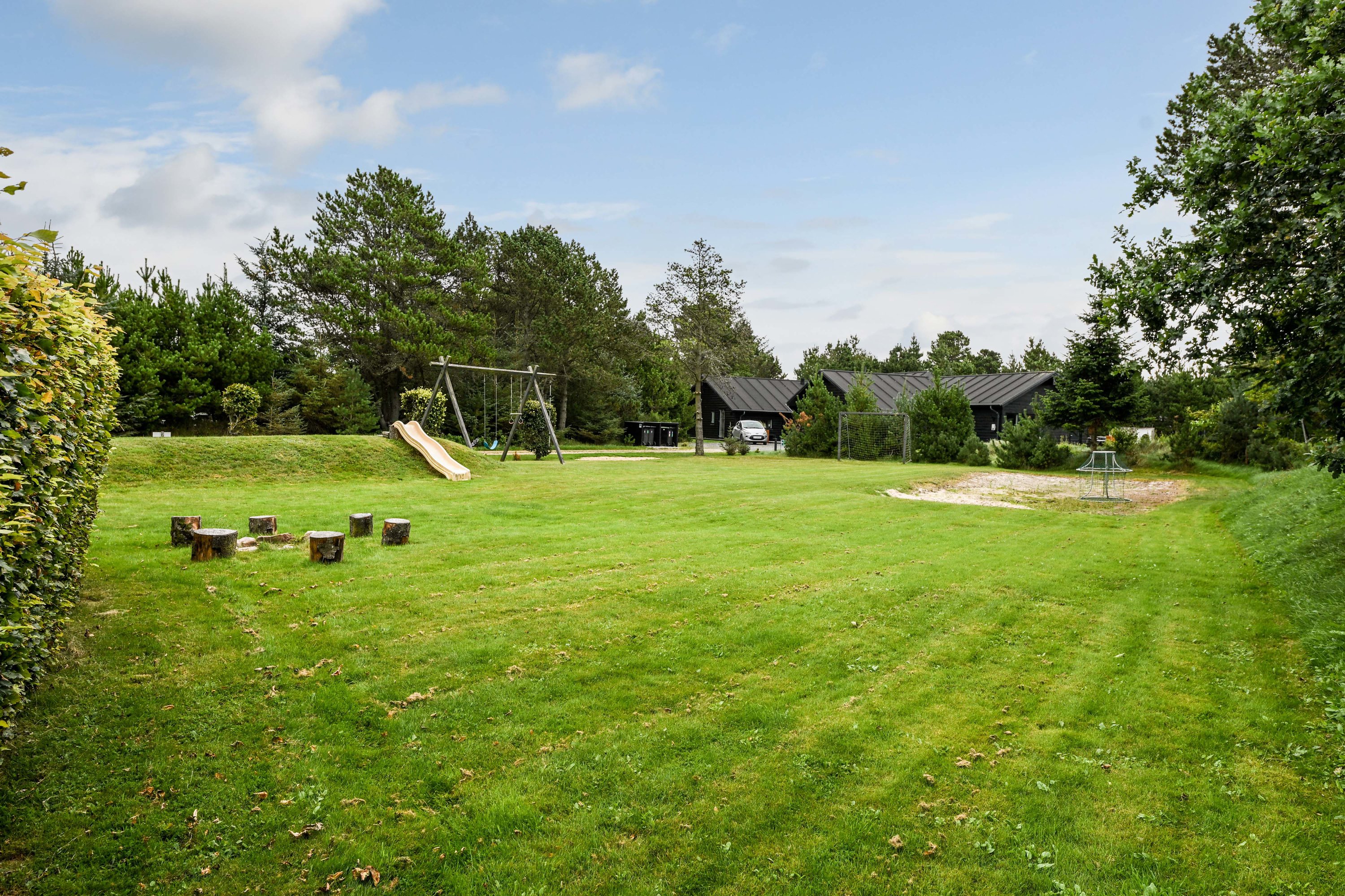 Fremhævet have billede i fuldskærmstilstand. Billede af Bjergbovej 11, 6857 Blåvand