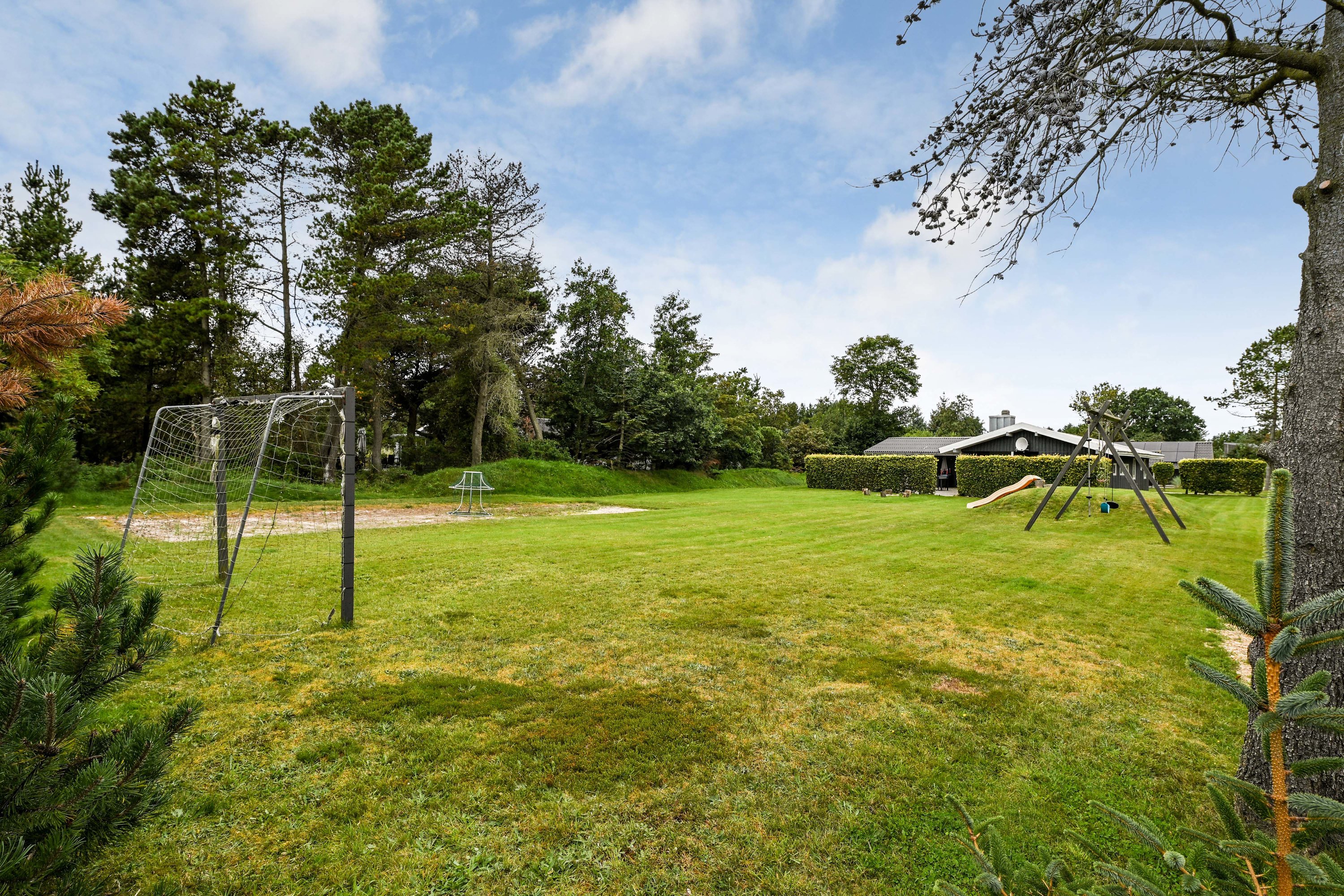 Fremhævet have billede i fuldskærmstilstand. Billede af Bjergbovej 11, 6857 Blåvand