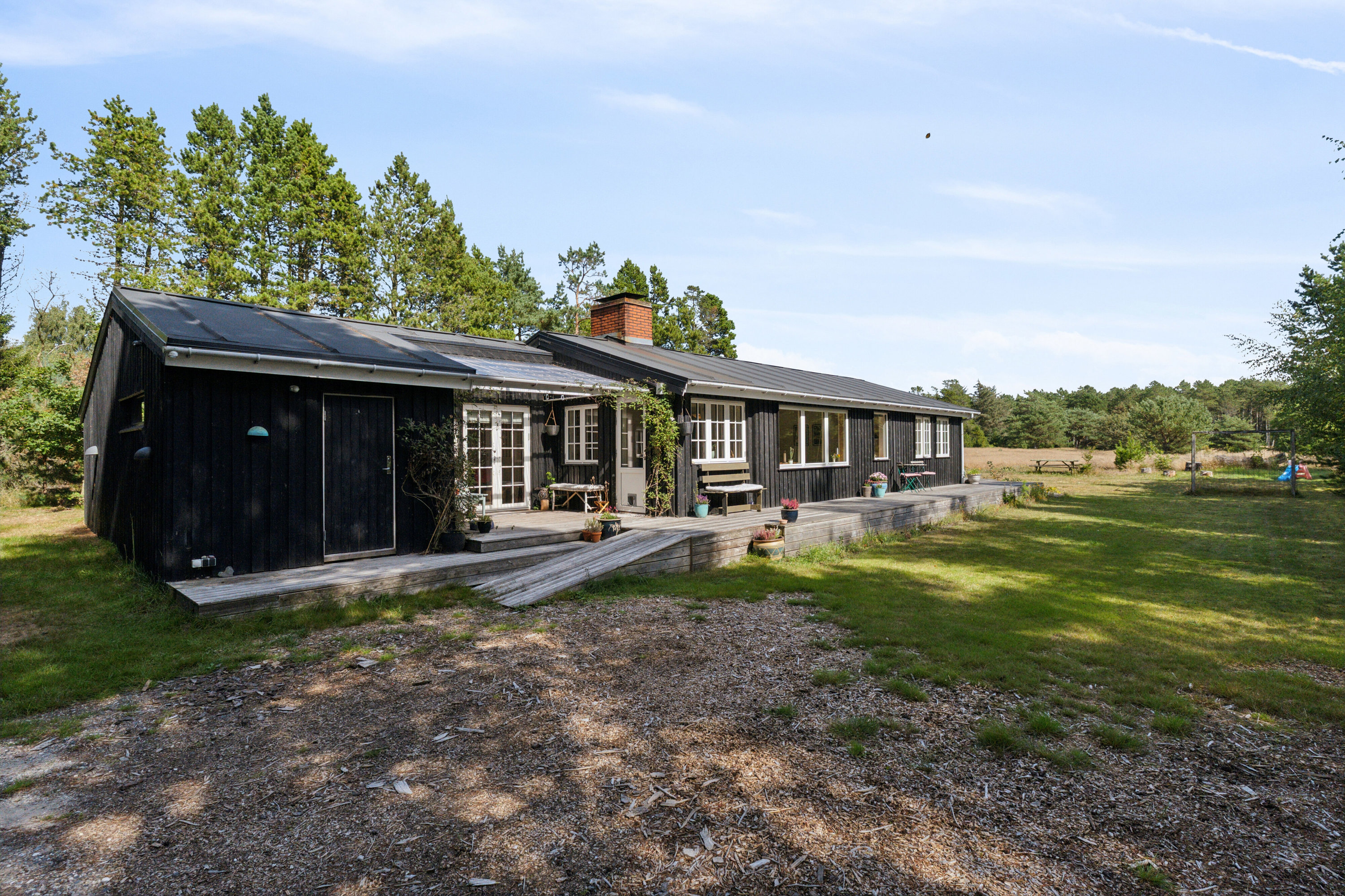 Fremhævet set fra haven billede i fuldskærmstilstand. Billede af Grønspættevej 9, Tversted, 9881 Bindslev