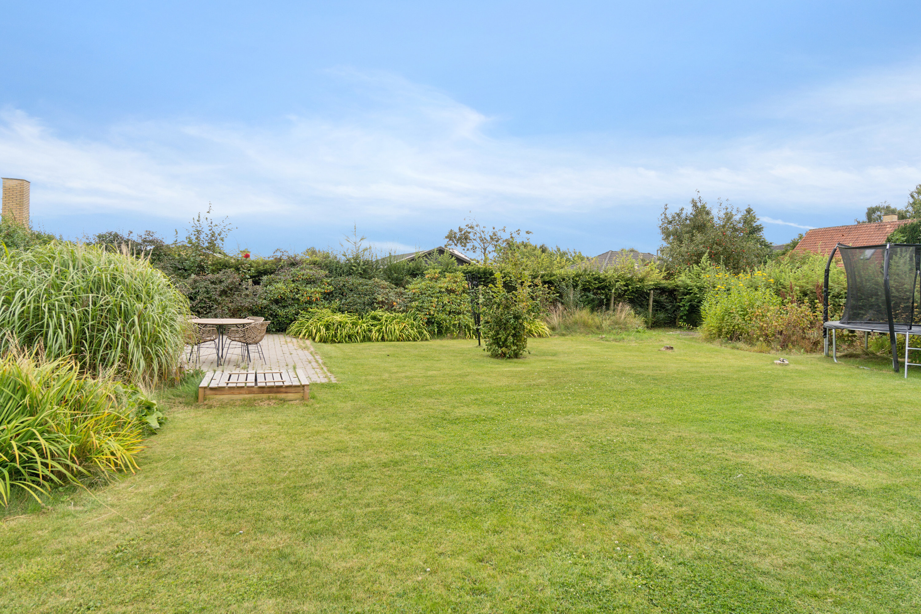 Fremhævet set fra haven billede i fuldskærmstilstand. Billede af Drosselvej 7, 8721 Daugård