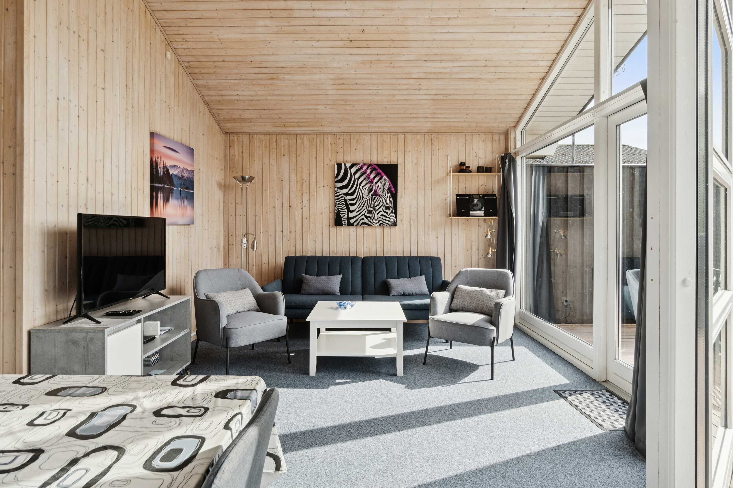 Fremhævet stue billede i fuldskærmstilstand. Billede af Lynghusvej 1C, 4500 Nykøbing Sj