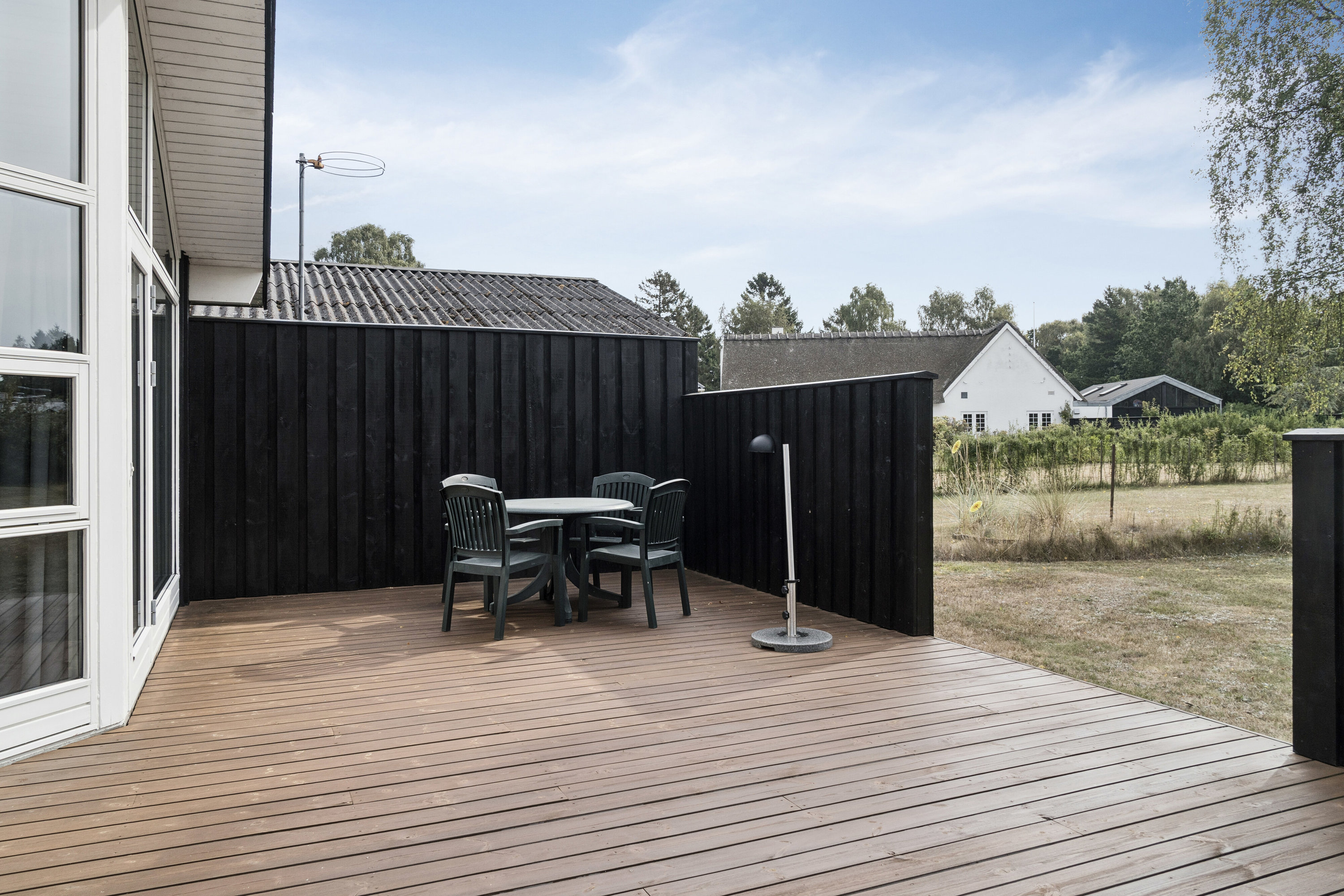 Fremhævet terrasse billede i fuldskærmstilstand. Billede af Lynghusvej 1C, 4500 Nykøbing Sj