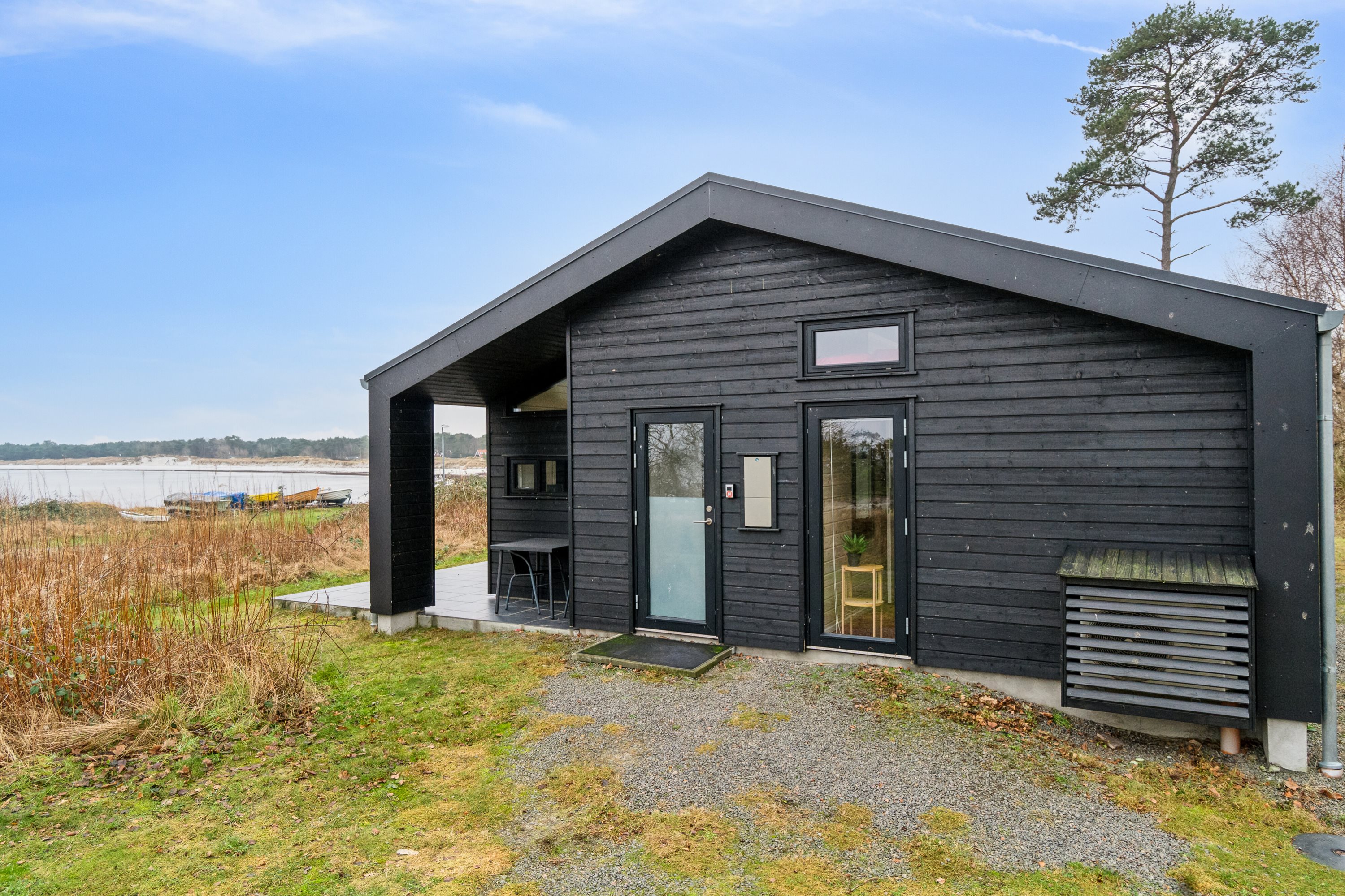 Fremhævet set fra haven billede i fuldskærmstilstand. Billede af Strandvolden 17, Balka, 3730 Nexø