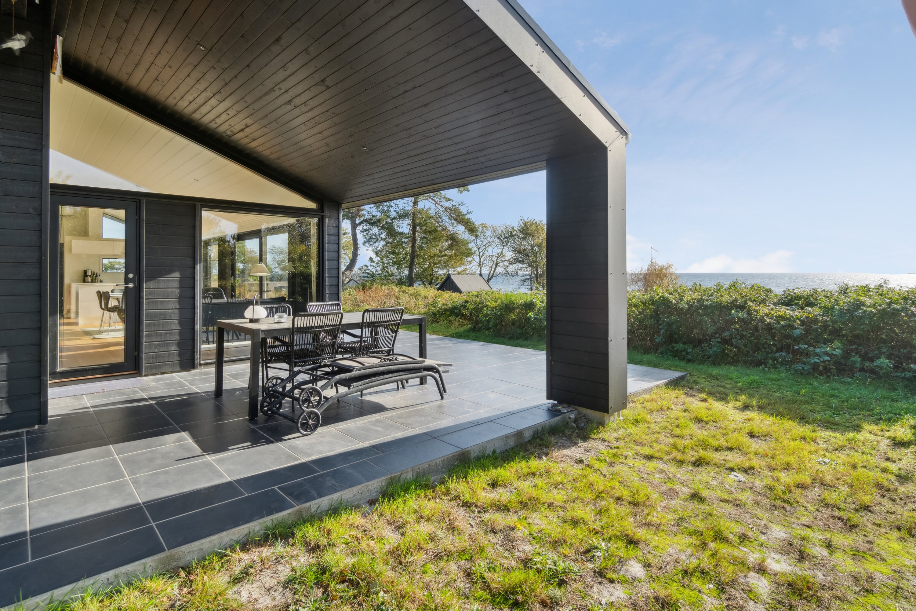 Fremhævet overdækket terrasse billede i fuldskærmstilstand. Billede af Strandvolden 17, Balka, 3730 Nexø