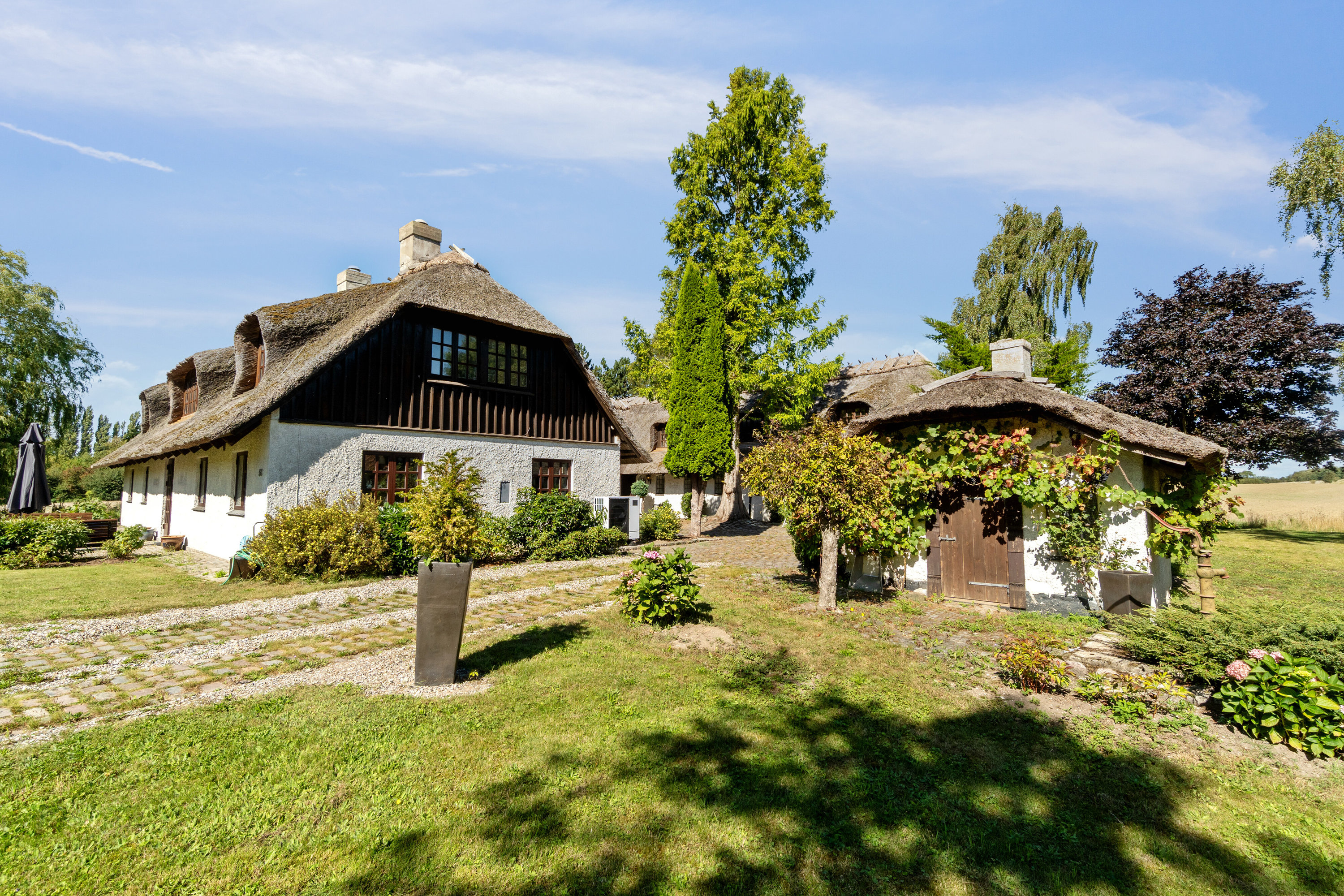 Fremhævet set fra haven billede i fuldskærmstilstand. Billede af Strandbakken 52, Klinteby, 4736 Karrebæksminde