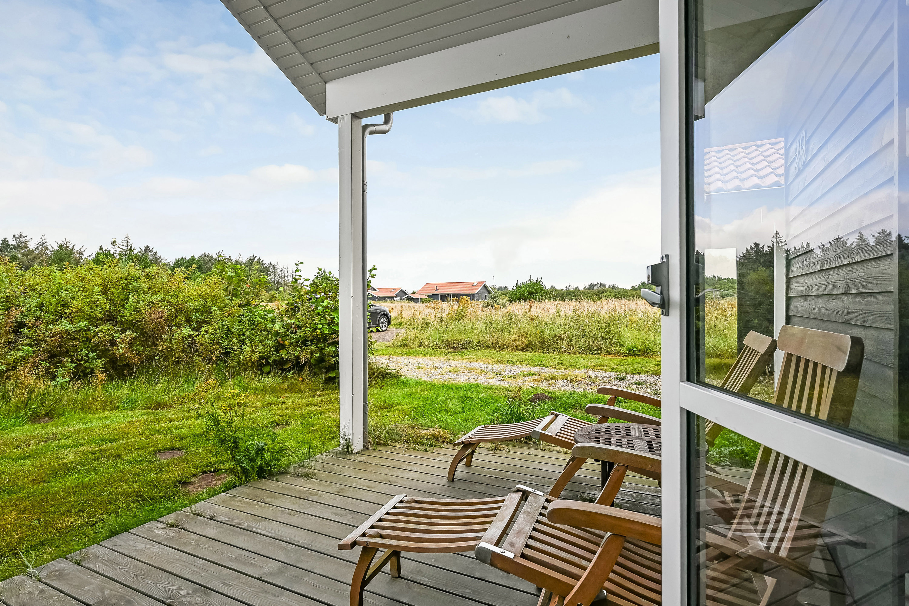 Fremhævet terrasse billede i fuldskærmstilstand. Billede af Fjand Strand 29, 6990 Ulfborg