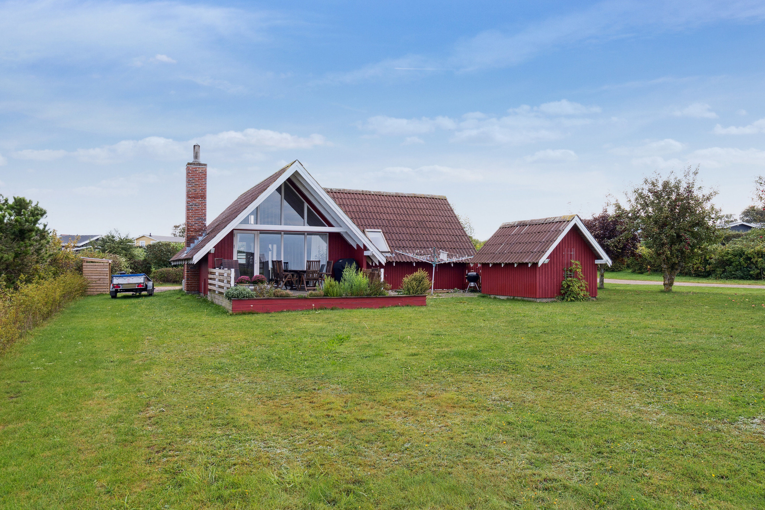 Fremhævet set fra haven billede i fuldskærmstilstand. Billede af Dansvej 1, Drøsselbjerg, 4200 Slagelse