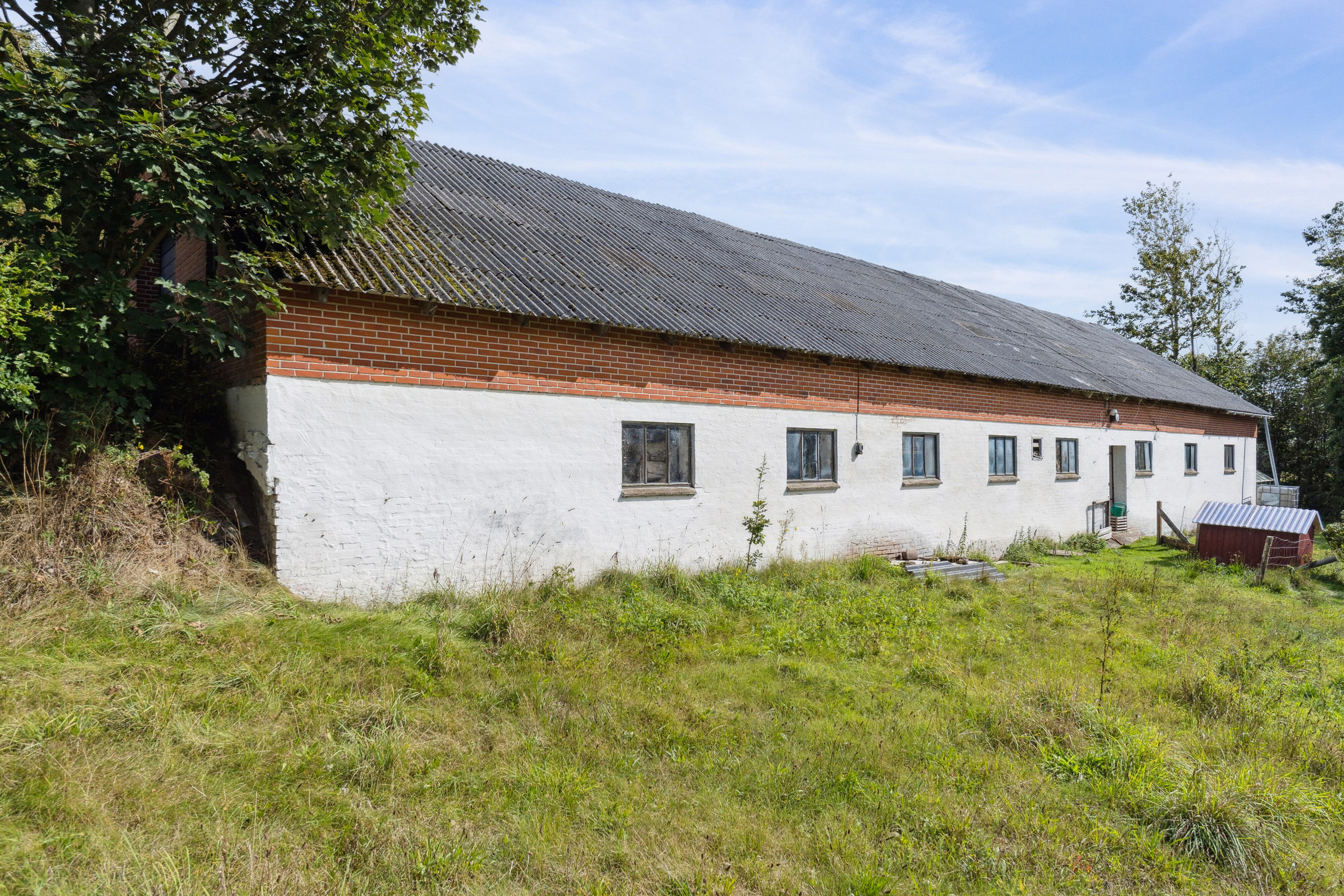 Fremhævet set fra haven billede i fuldskærmstilstand. Billede af Bagterpvej 204, 9800 Hjørring