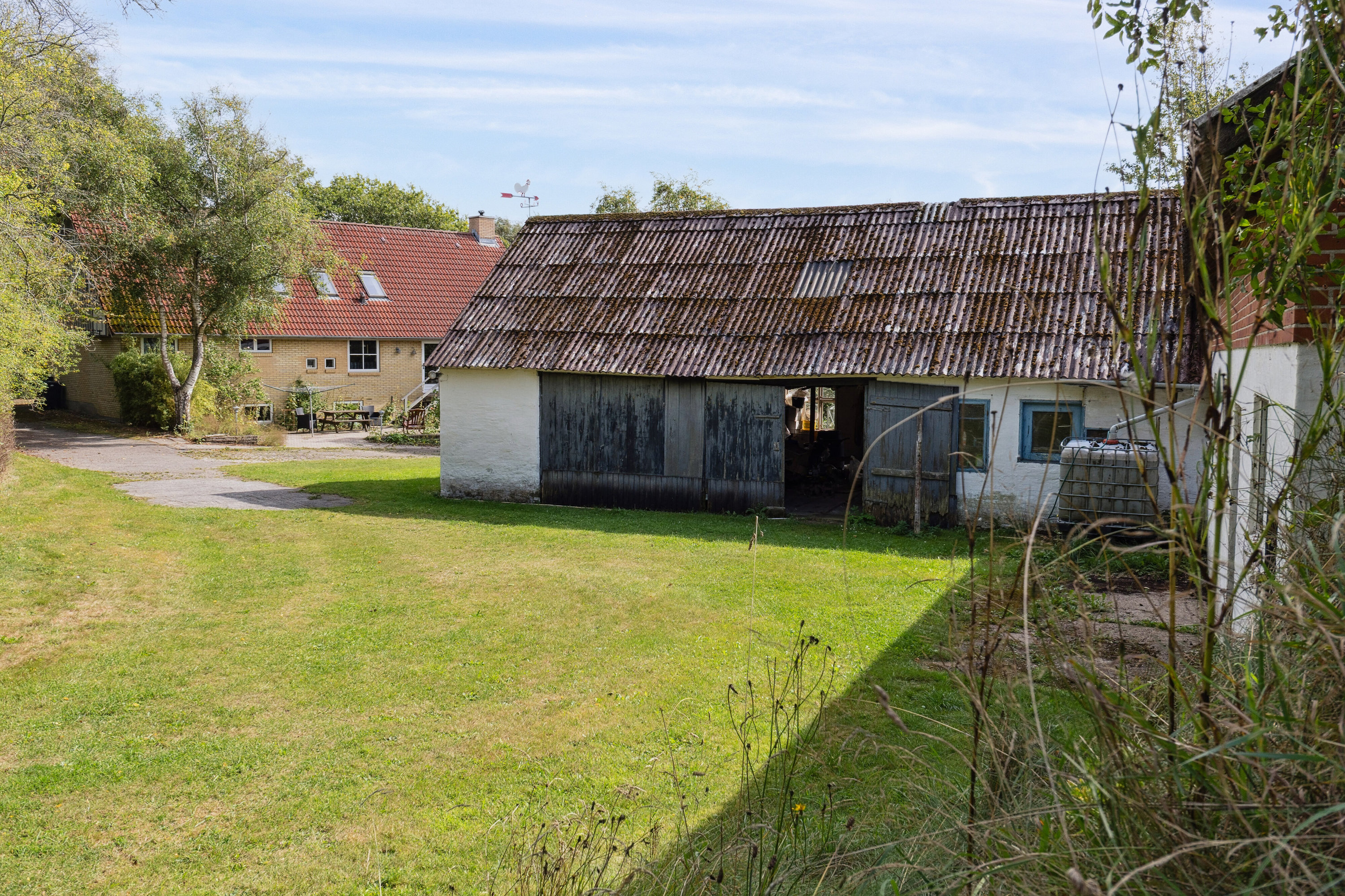 Fremhævet set fra haven billede i fuldskærmstilstand. Billede af Bagterpvej 204, 9800 Hjørring
