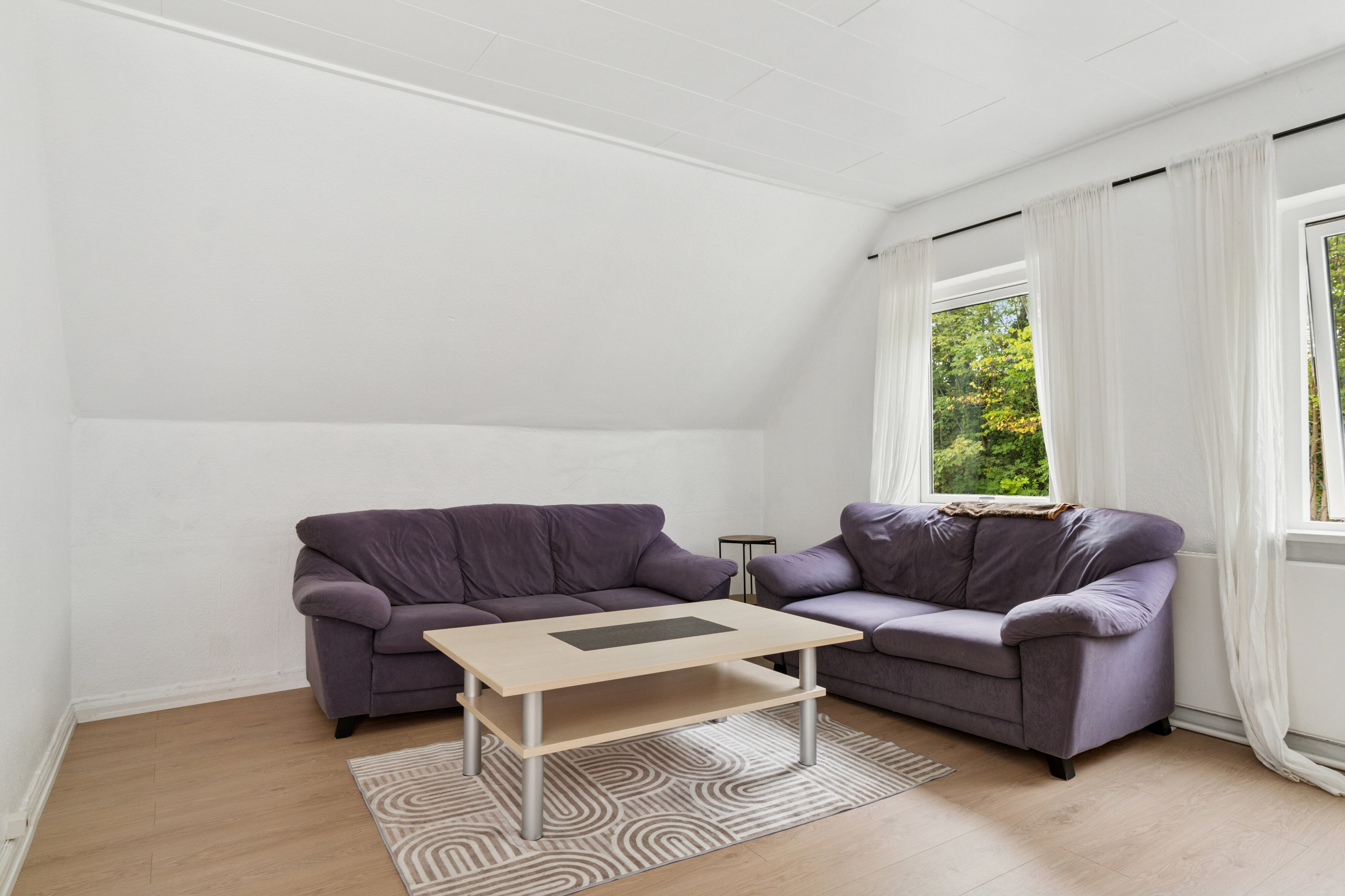 Fremhævet stue billede i fuldskærmstilstand. Billede af Nordre Banevej 8, st.. +1., 4300 Holbæk