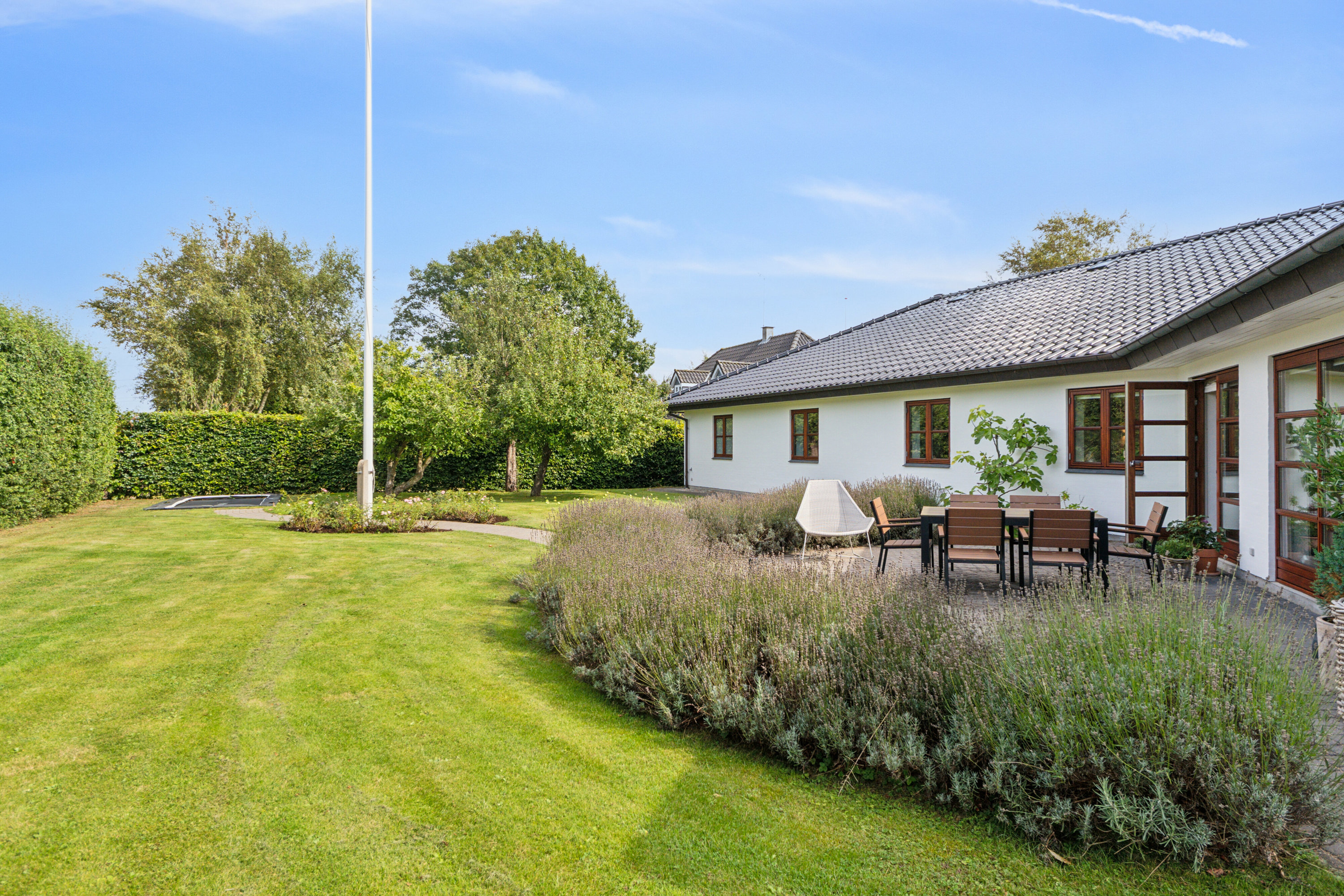 Fremhævet set fra haven billede i fuldskærmstilstand. Billede af Mosegårdvej 6, Balslev, 5592 Ejby