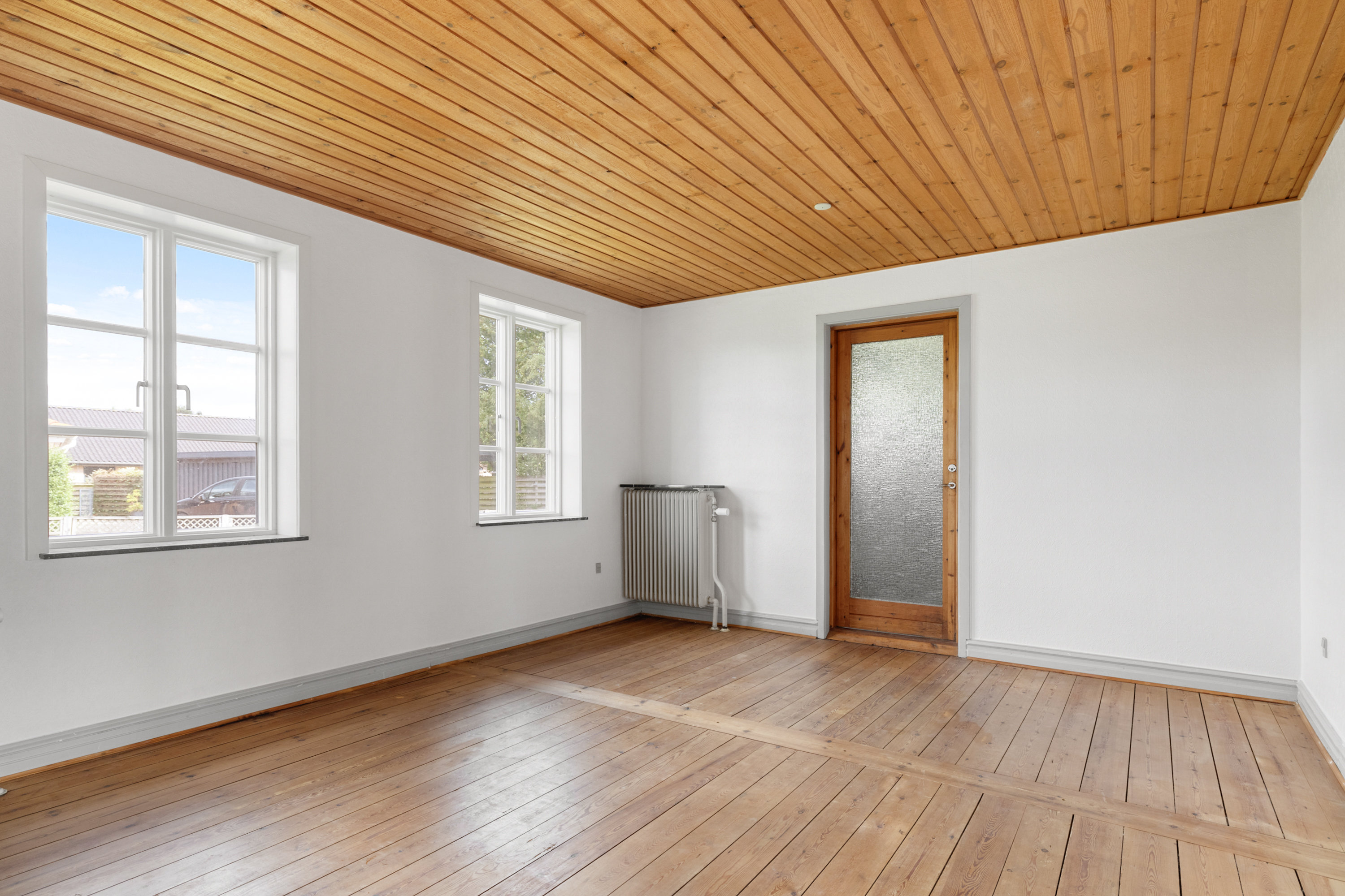 Fremhævet stue billede i fuldskærmstilstand. Billede af Østerbyvej 1D, 8310 Tranbjerg J