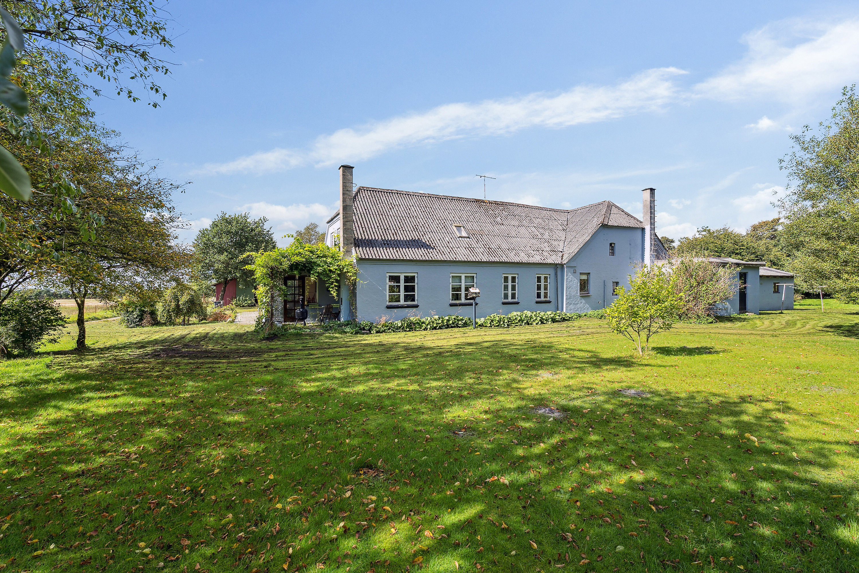 Fremhævet set fra haven billede i fuldskærmstilstand. Billede af Malmkærvej 6, Dyringhave, 7361 Ejstrupholm