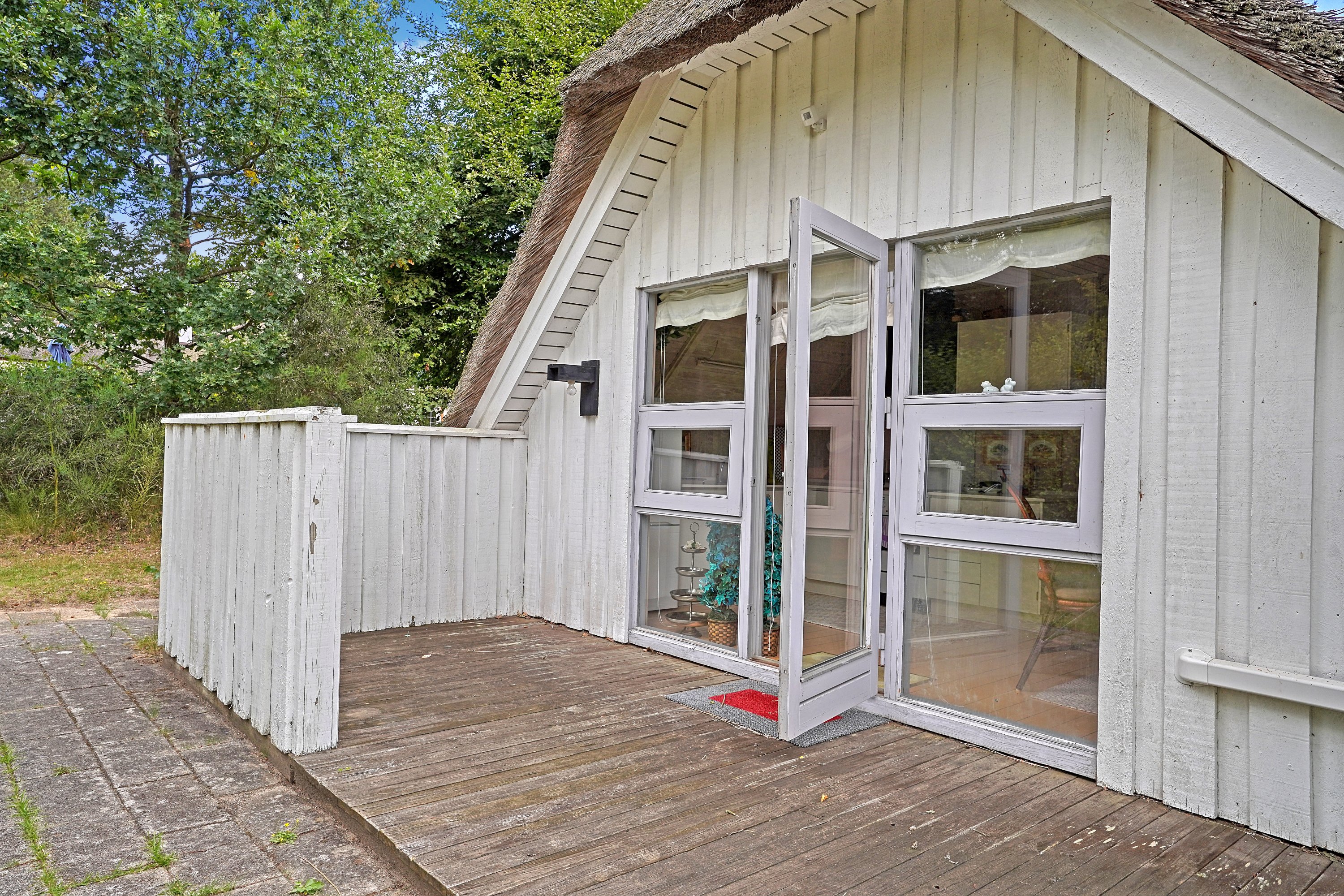 Fremhævet terrasse billede i fuldskærmstilstand. Billede af Ravnsbækvej 3, 3100 Hornbæk