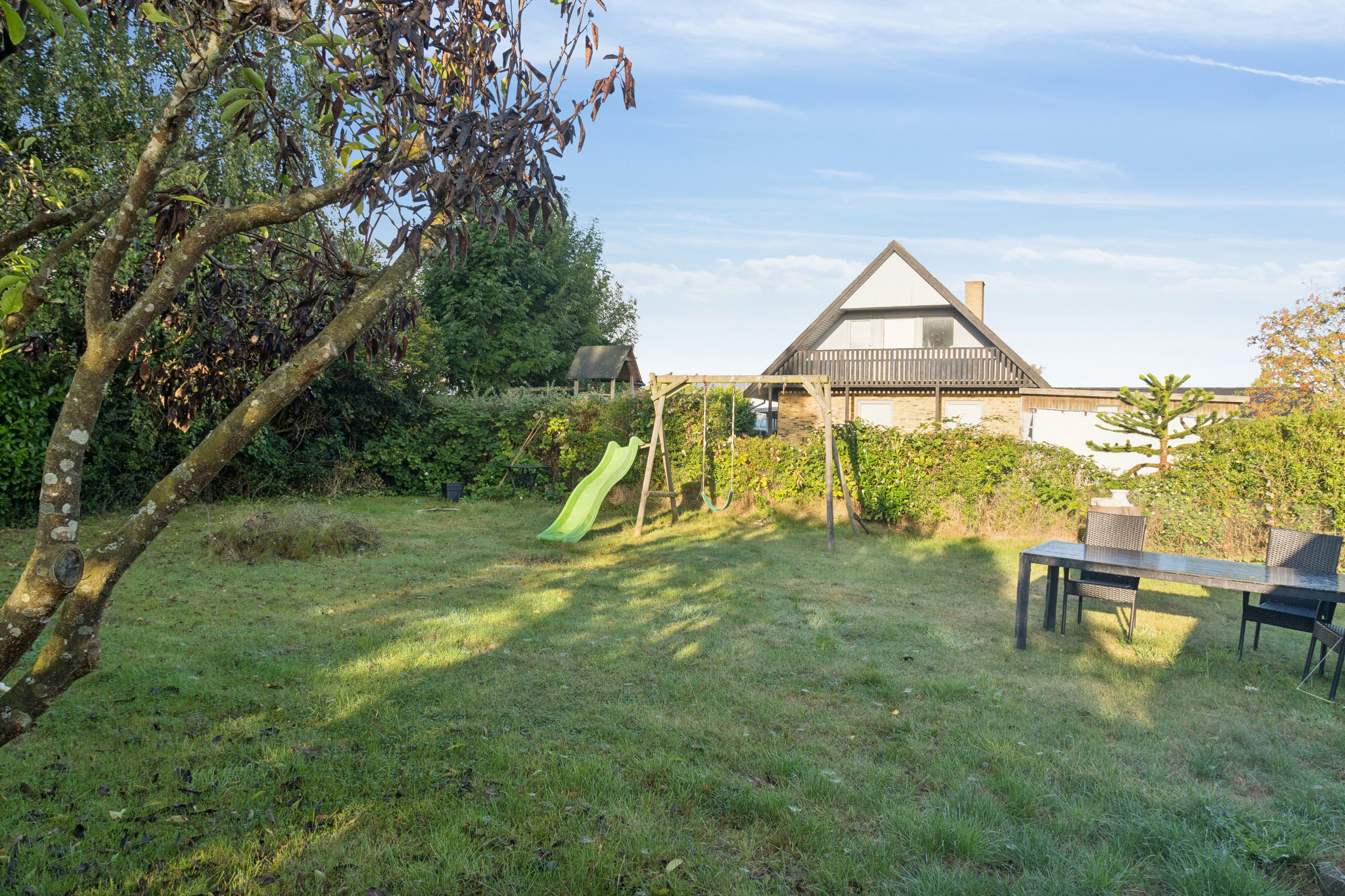 Fremhævet set fra haven billede i fuldskærmstilstand. Billede af Rørvigvej 41, 4500 Nykøbing Sj