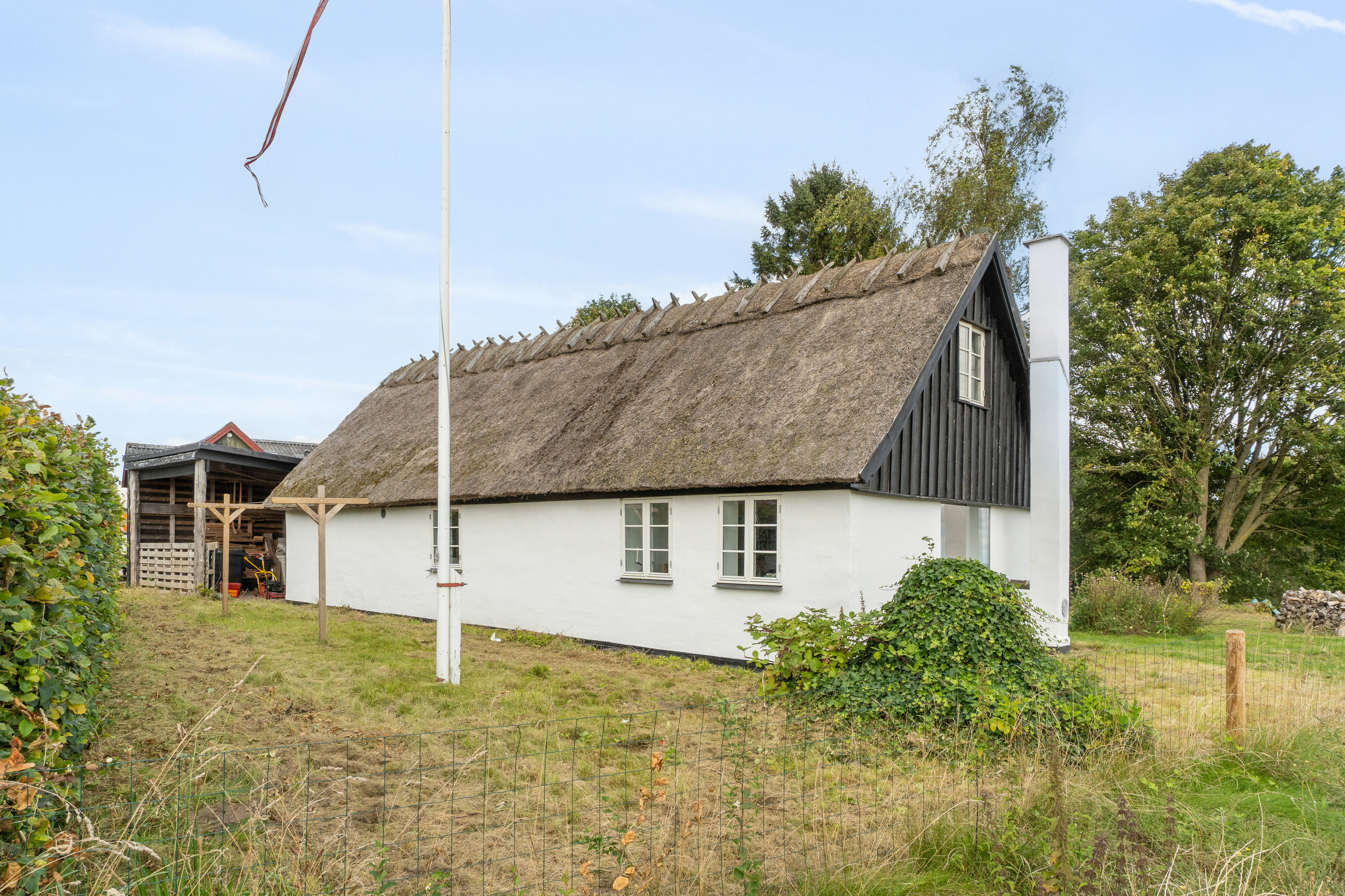 Fremhævet set fra haven billede i fuldskærmstilstand. Billede af Højgårdsvej 41, Eskilstrup, 4683 Rønnede