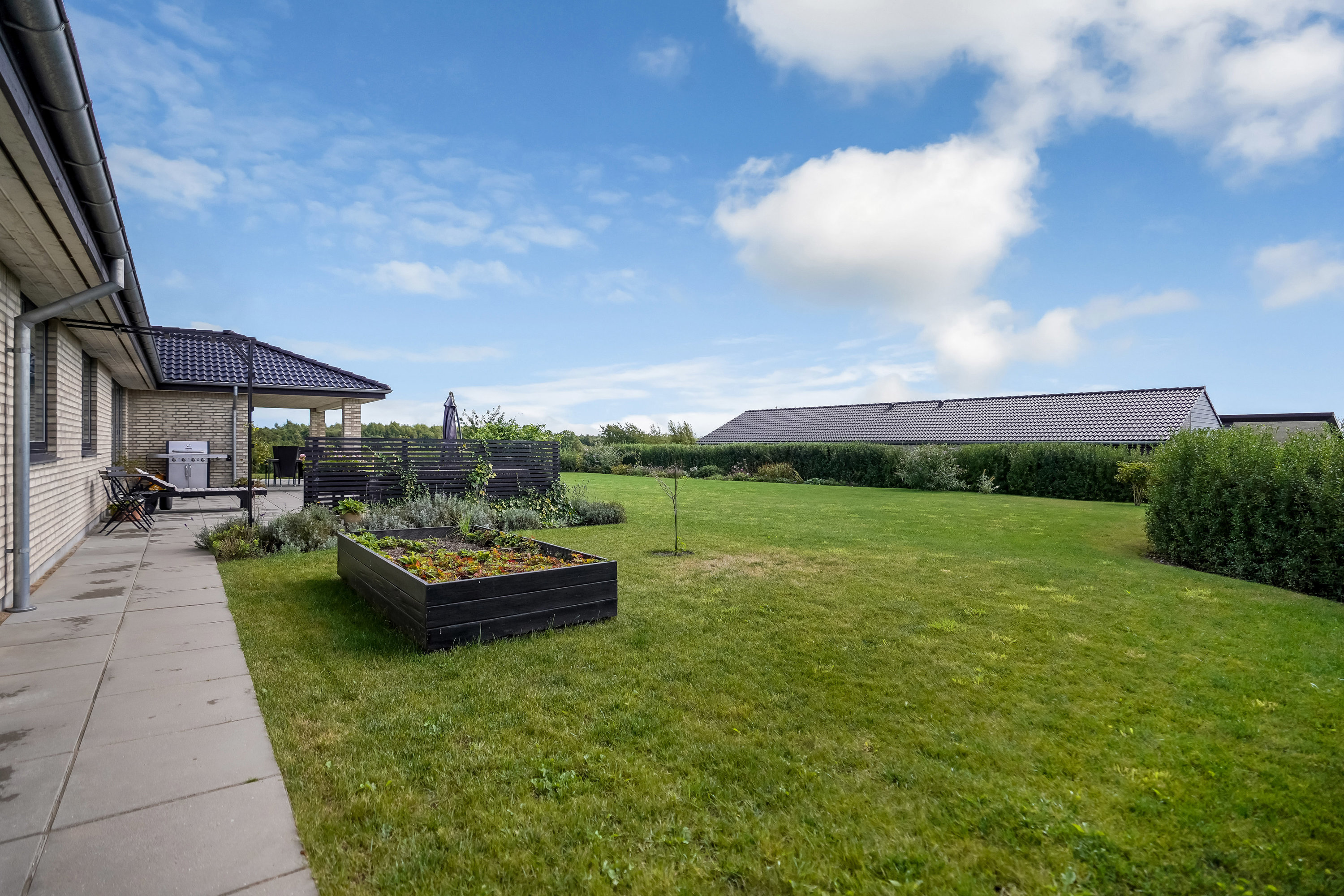 Fremhævet have billede i fuldskærmstilstand. Billede af Kirkebyvænget 34, 5592 Ejby