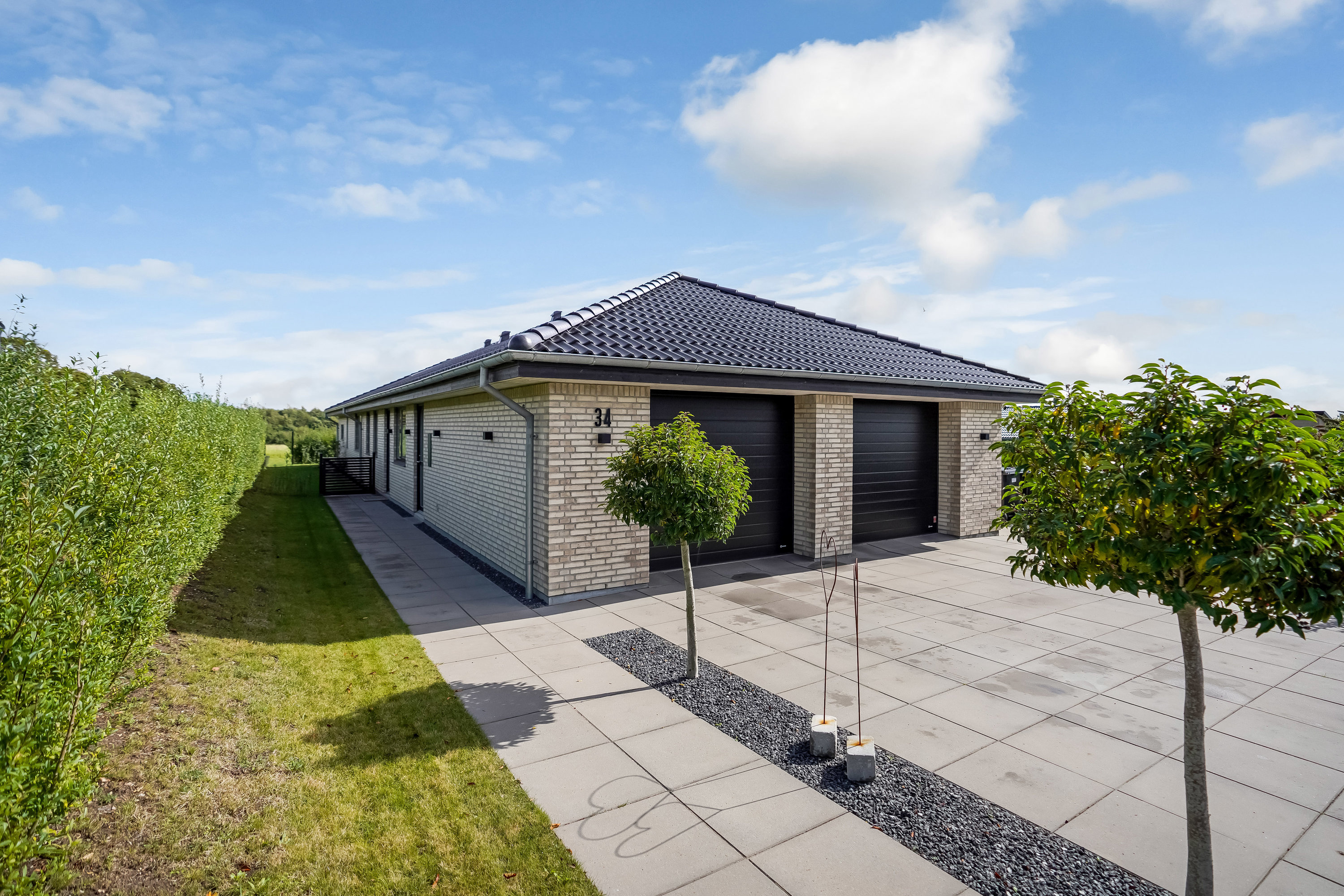 Fremhævet ejendommen billede i fuldskærmstilstand. Billede af Kirkebyvænget 34, 5592 Ejby