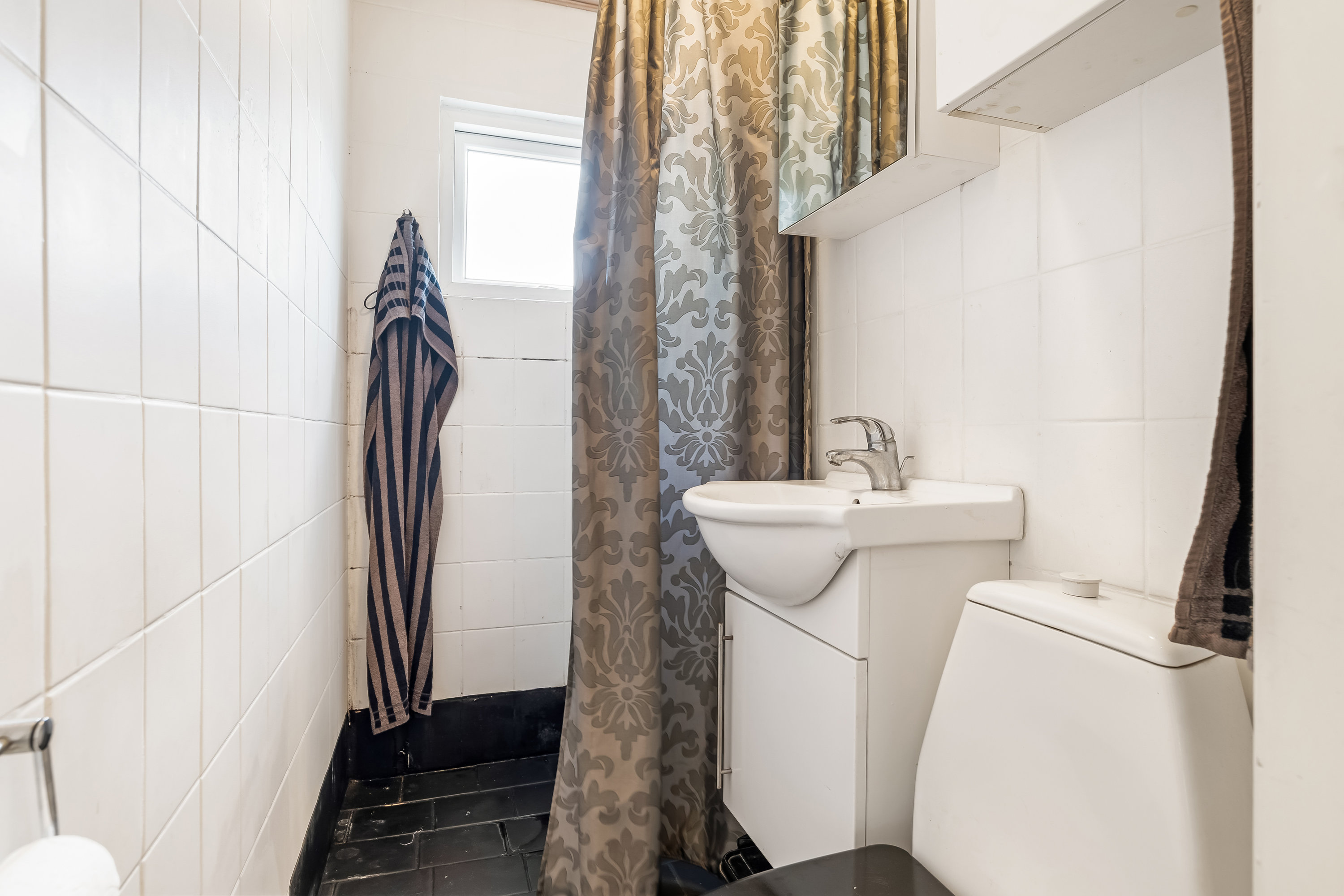 Fremhævet badeværelse billede i fuldskærmstilstand. Billede af Valmuevej 6, 7500 Holstebro