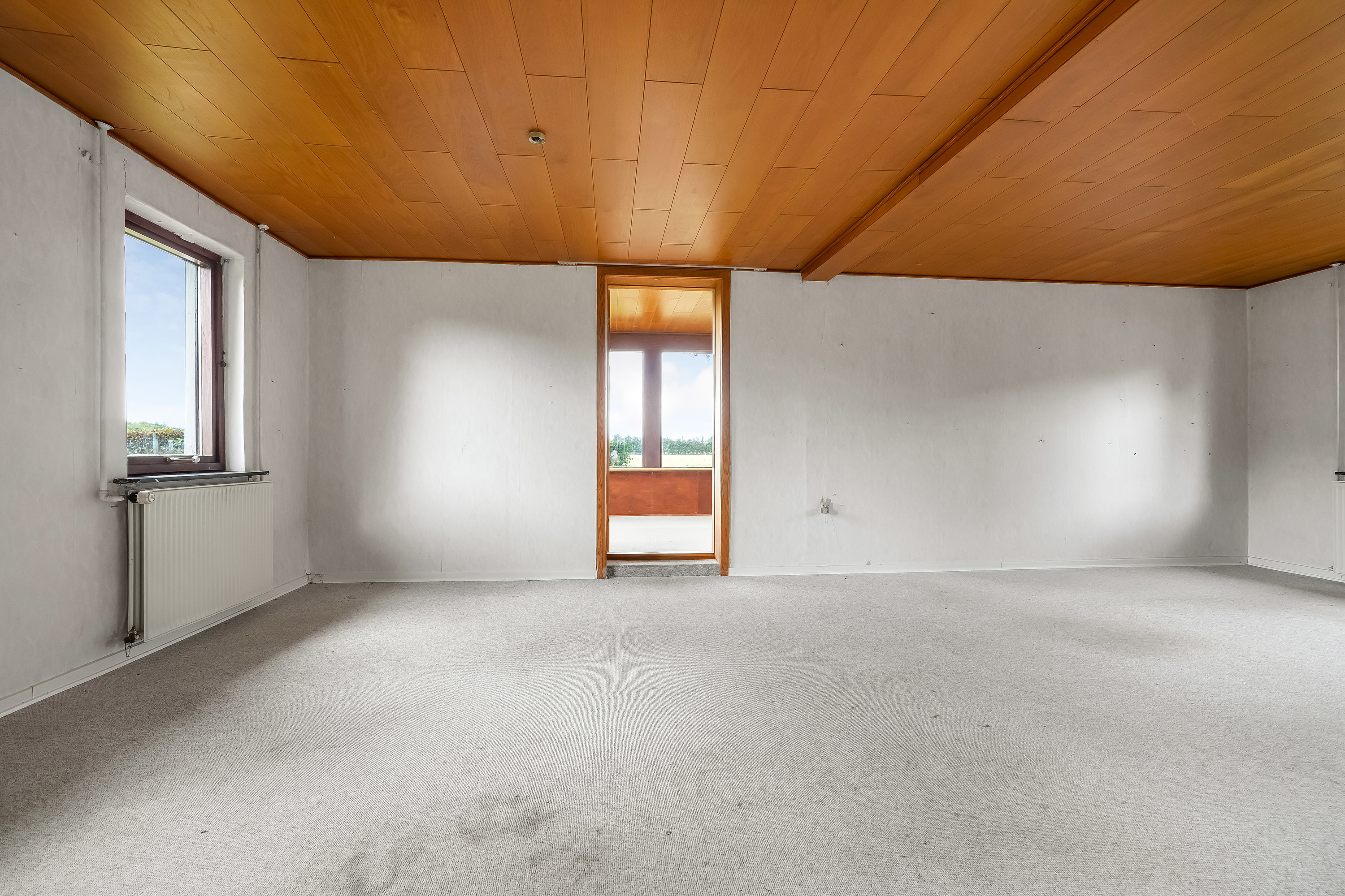 Fremhævet stue billede i fuldskærmstilstand. Billede af Herningvej 11, 7300 Jelling