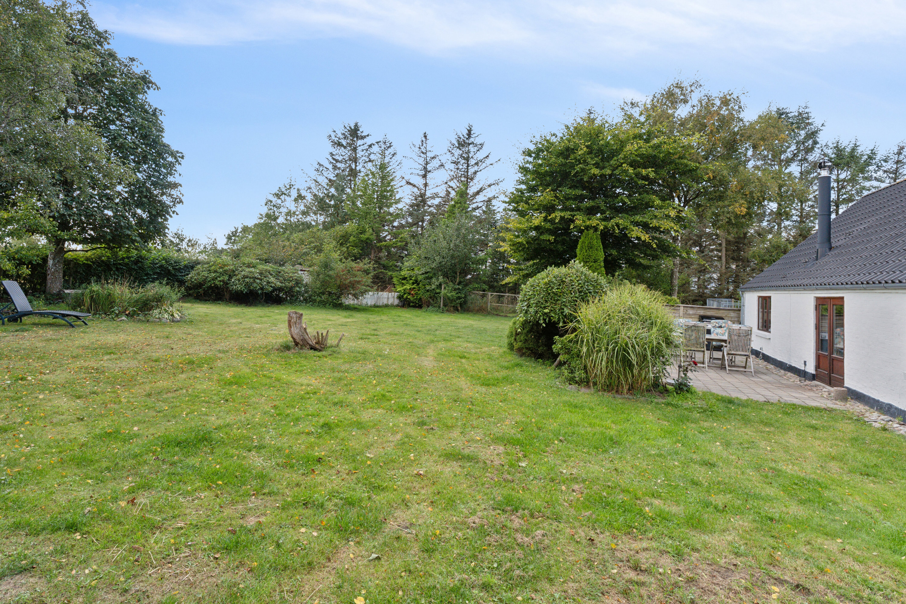 Fremhævet set fra haven billede i fuldskærmstilstand. Billede af Stokholmvej 146, 9870 Sindal