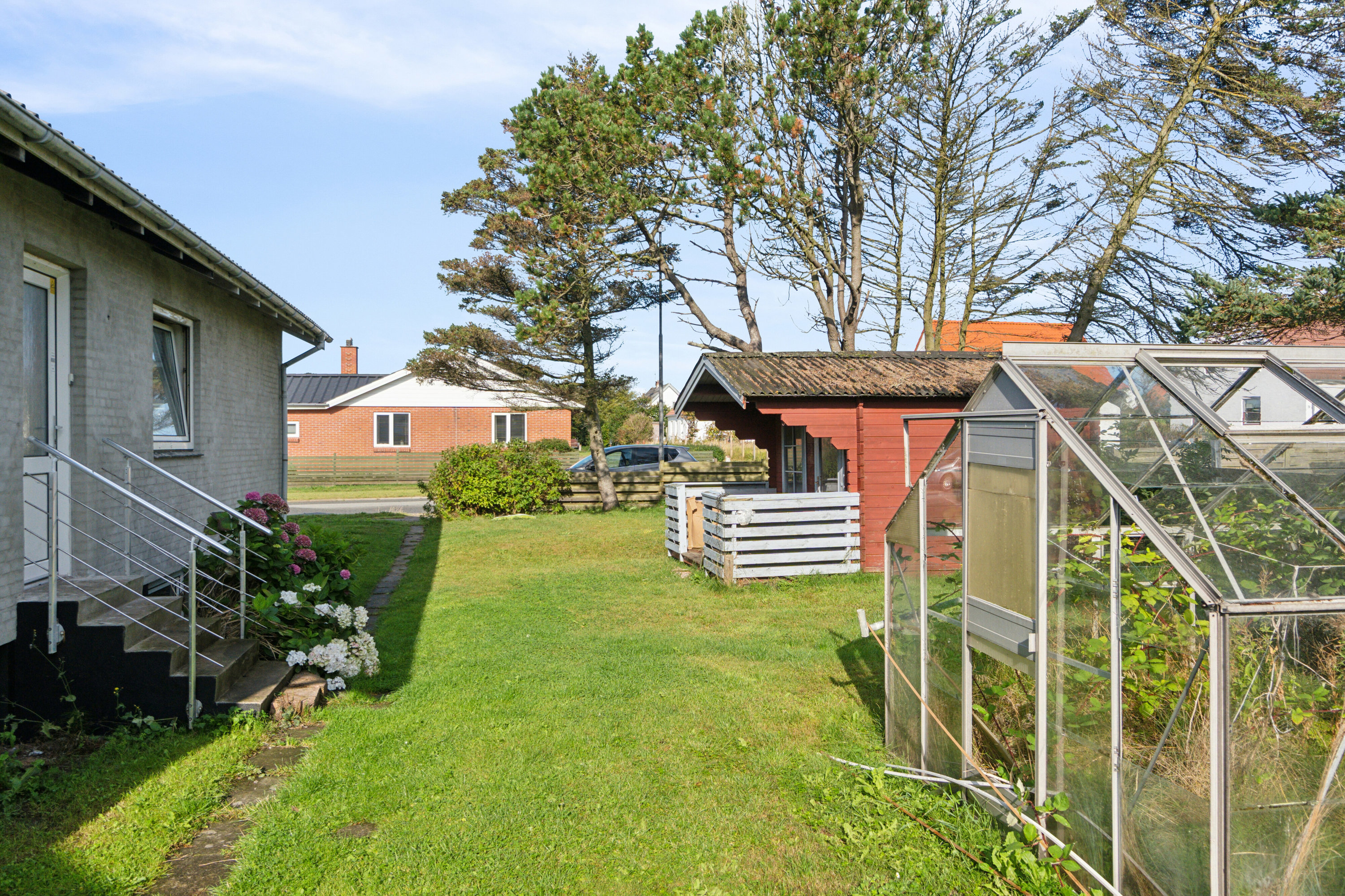 Fremhævet set fra haven billede i fuldskærmstilstand. Billede af Bellisvænget 1, 7730 Hanstholm