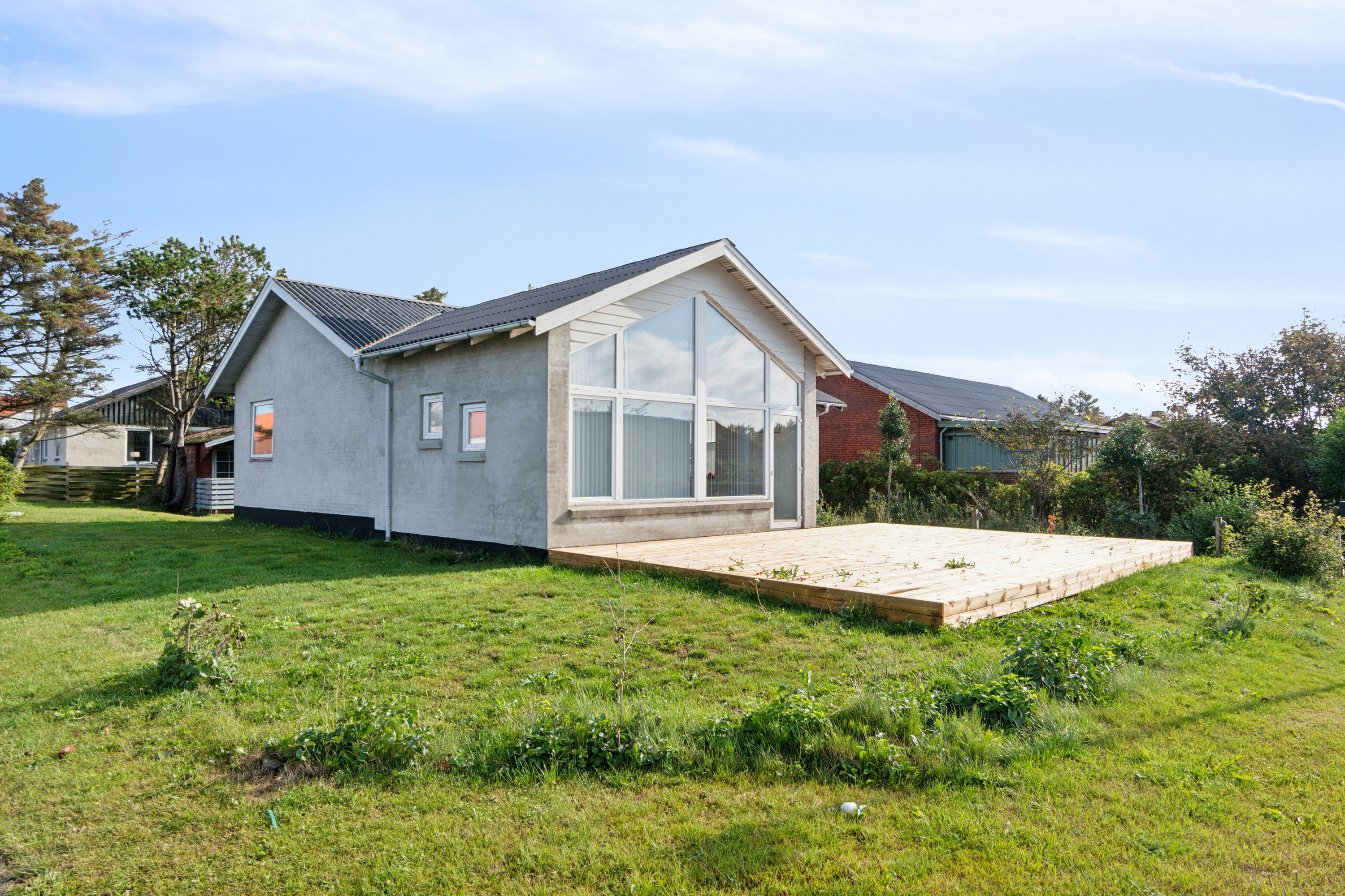 Fremhævet set fra haven billede i fuldskærmstilstand. Billede af Bellisvænget 1, 7730 Hanstholm