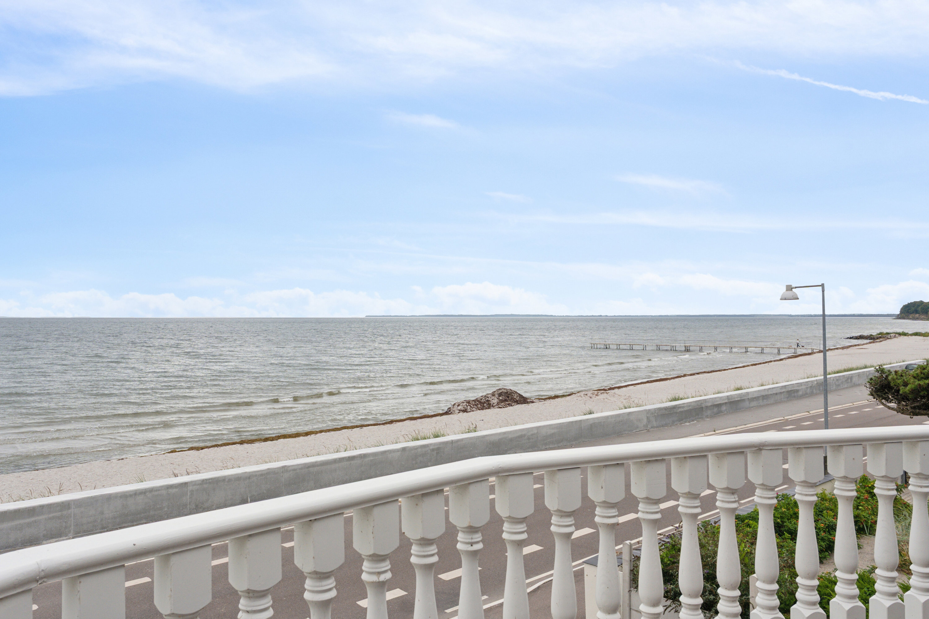 Fremhævet altan billede i fuldskærmstilstand. Billede af Strandvejen 48, 4654 Faxe Ladeplads