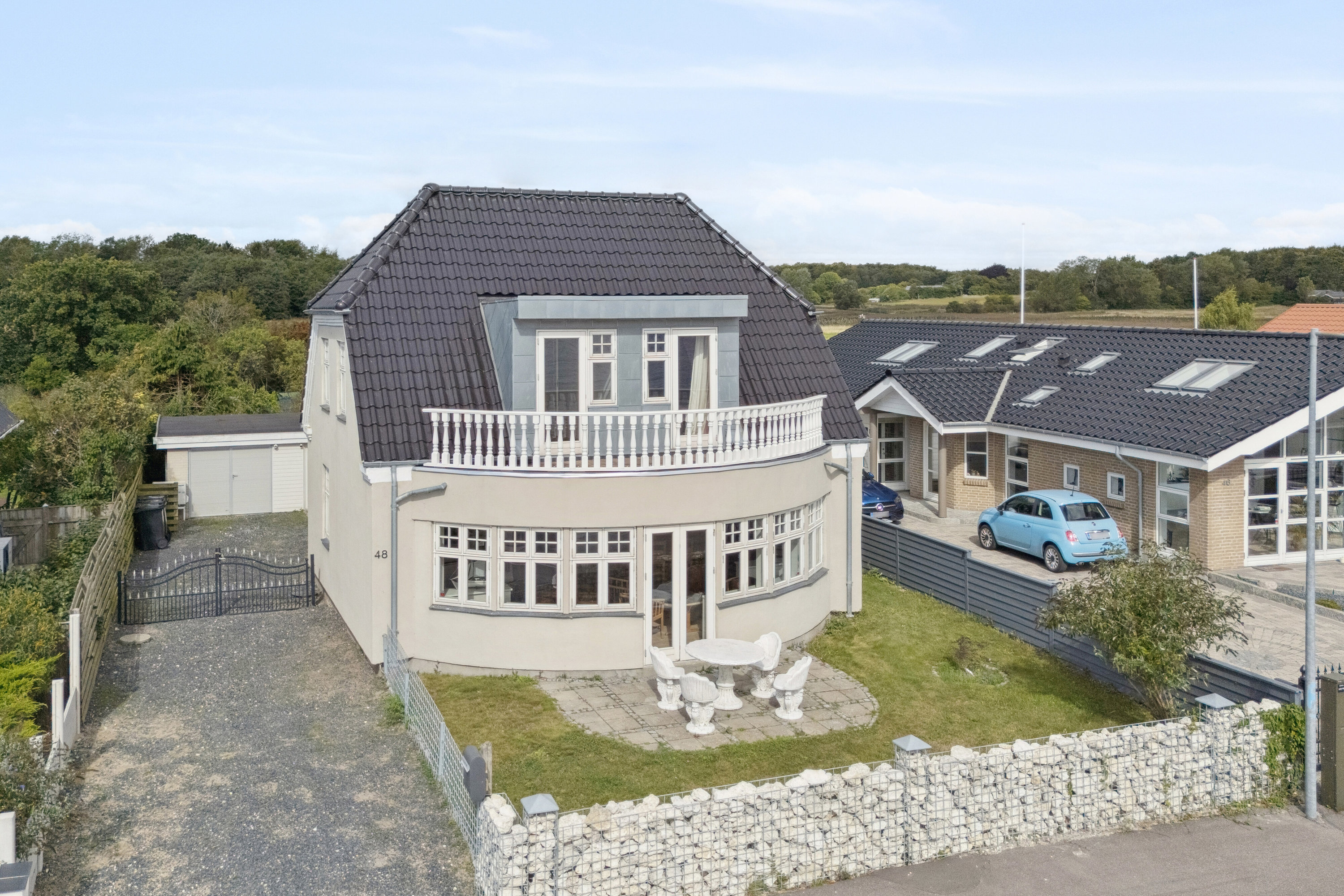 Fremhævet set fra vejen billede i fuldskærmstilstand. Billede af Strandvejen 48, 4654 Faxe Ladeplads