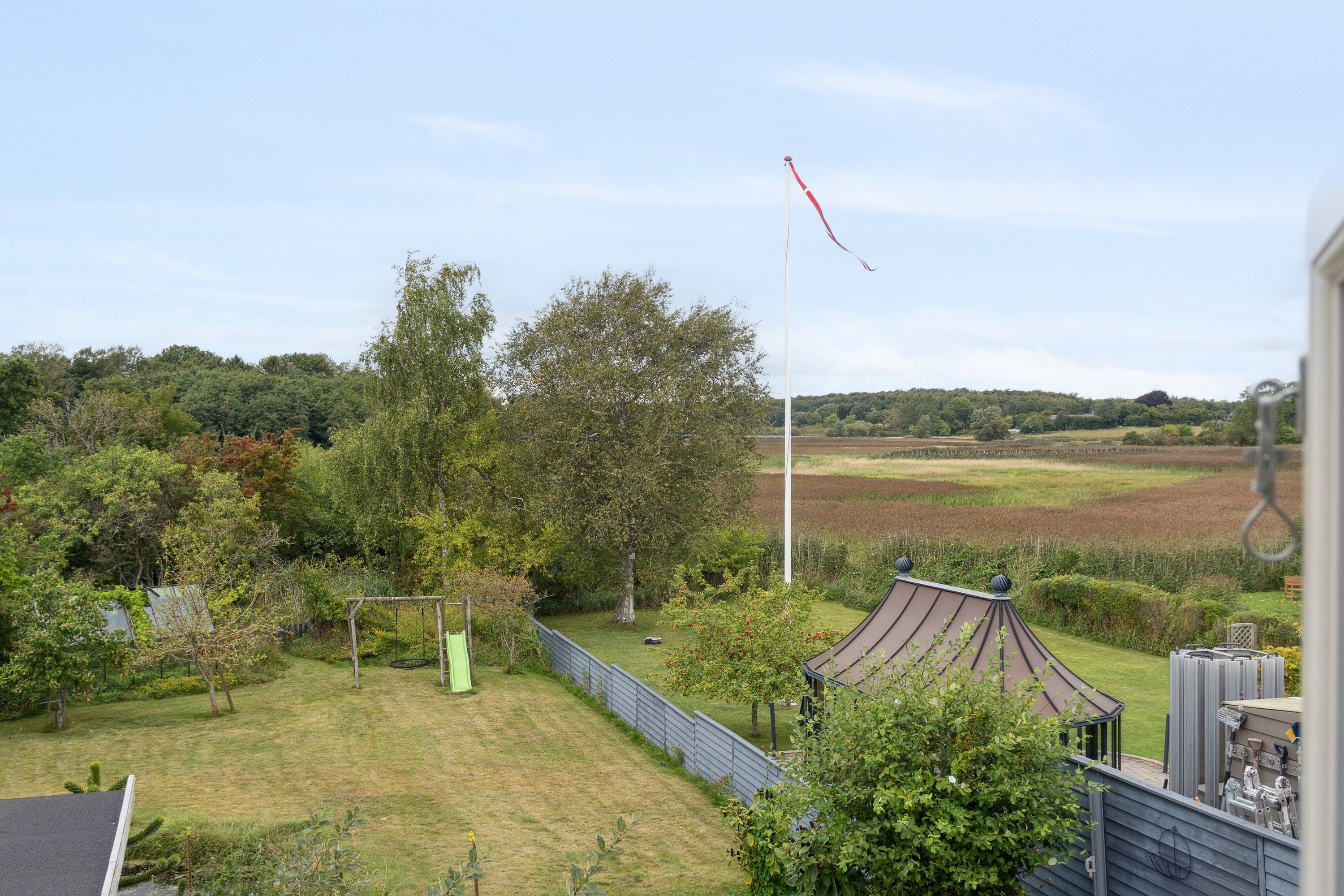 Fremhævet udendørs billede i fuldskærmstilstand. Billede af Strandvejen 48, 4654 Faxe Ladeplads