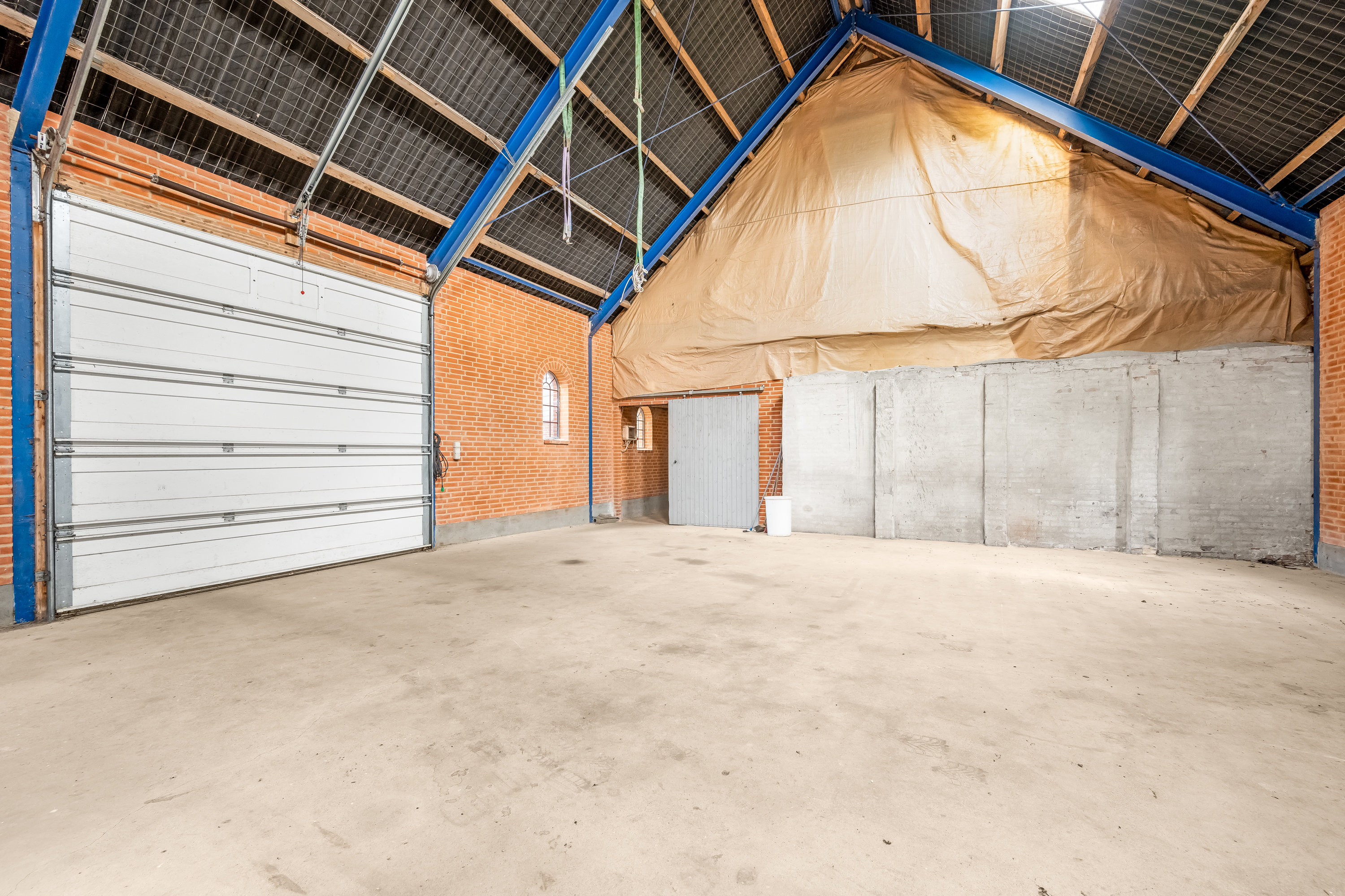 Fremhævet opbevaringshal billede i fuldskærmstilstand. Billede af Videbækvej 2, Faster, 6900 Skjern