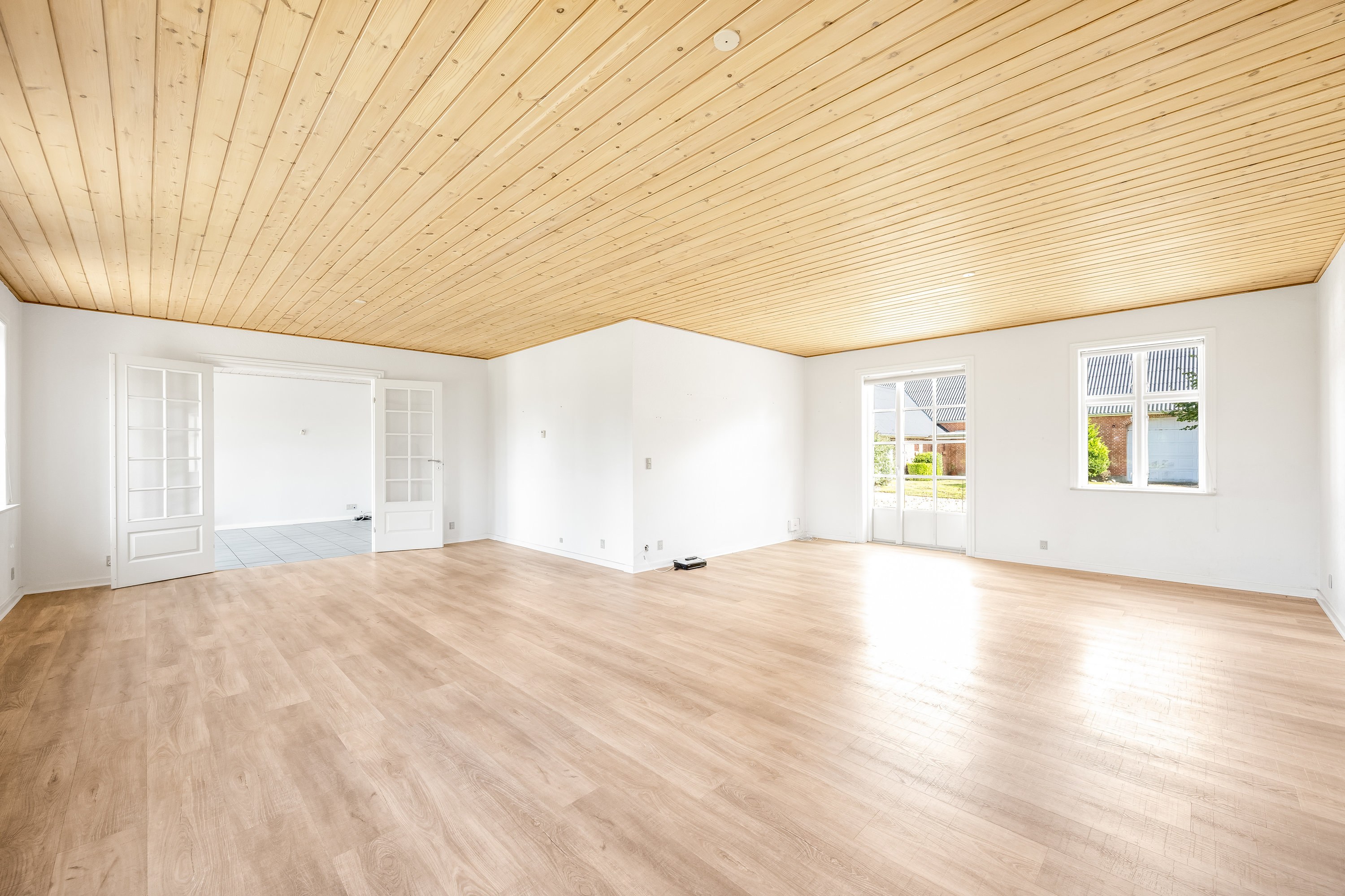 Fremhævet stue billede i fuldskærmstilstand. Billede af Videbækvej 2, Faster, 6900 Skjern