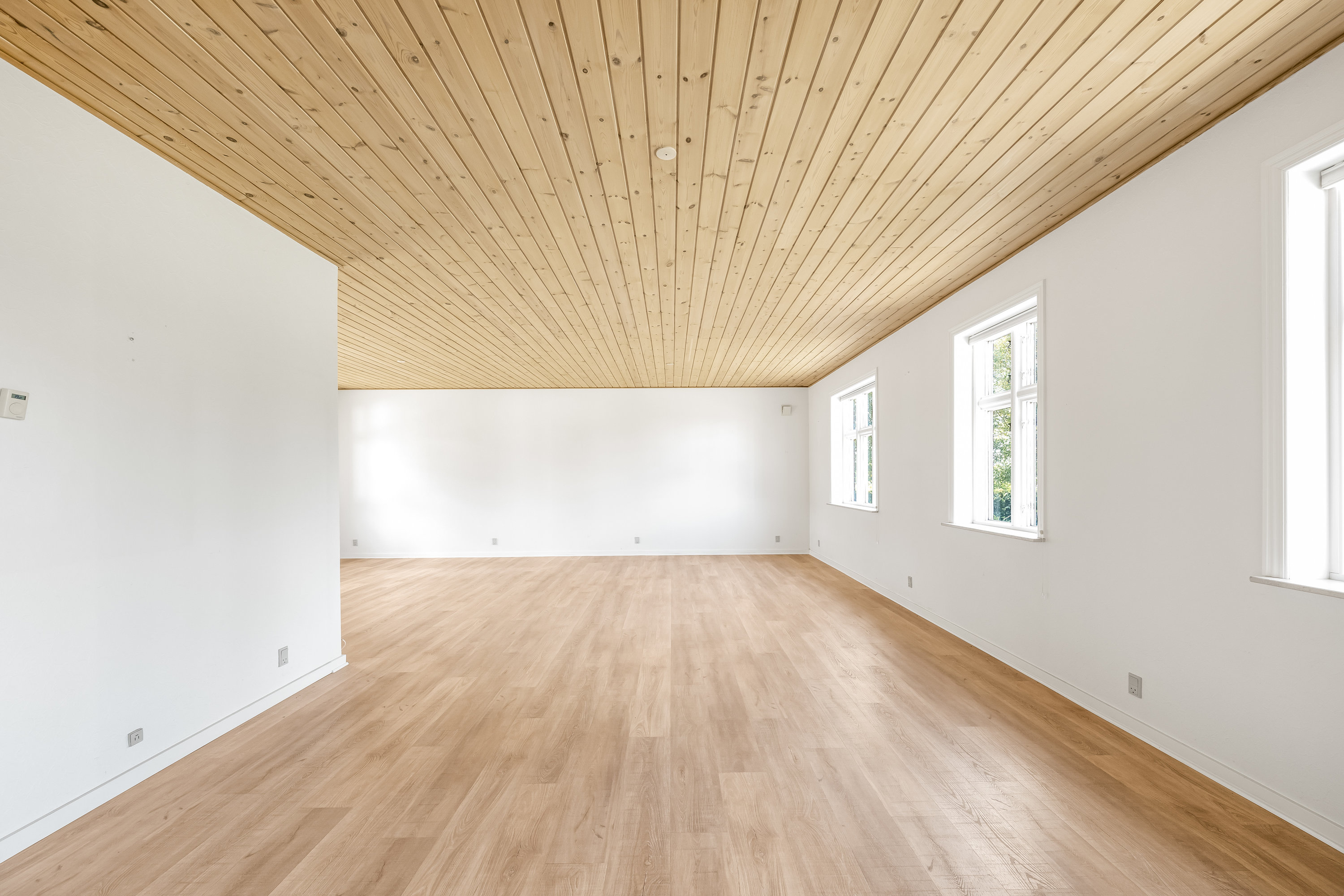 Fremhævet stue billede i fuldskærmstilstand. Billede af Videbækvej 2, Faster, 6900 Skjern