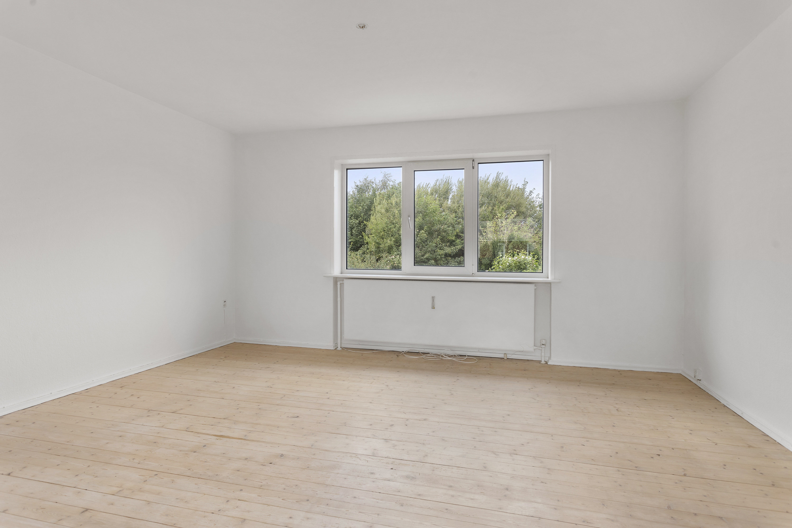 Fremhævet stue billede i fuldskærmstilstand. Billede af Svanholmsvej 13, 9900 Frederikshavn